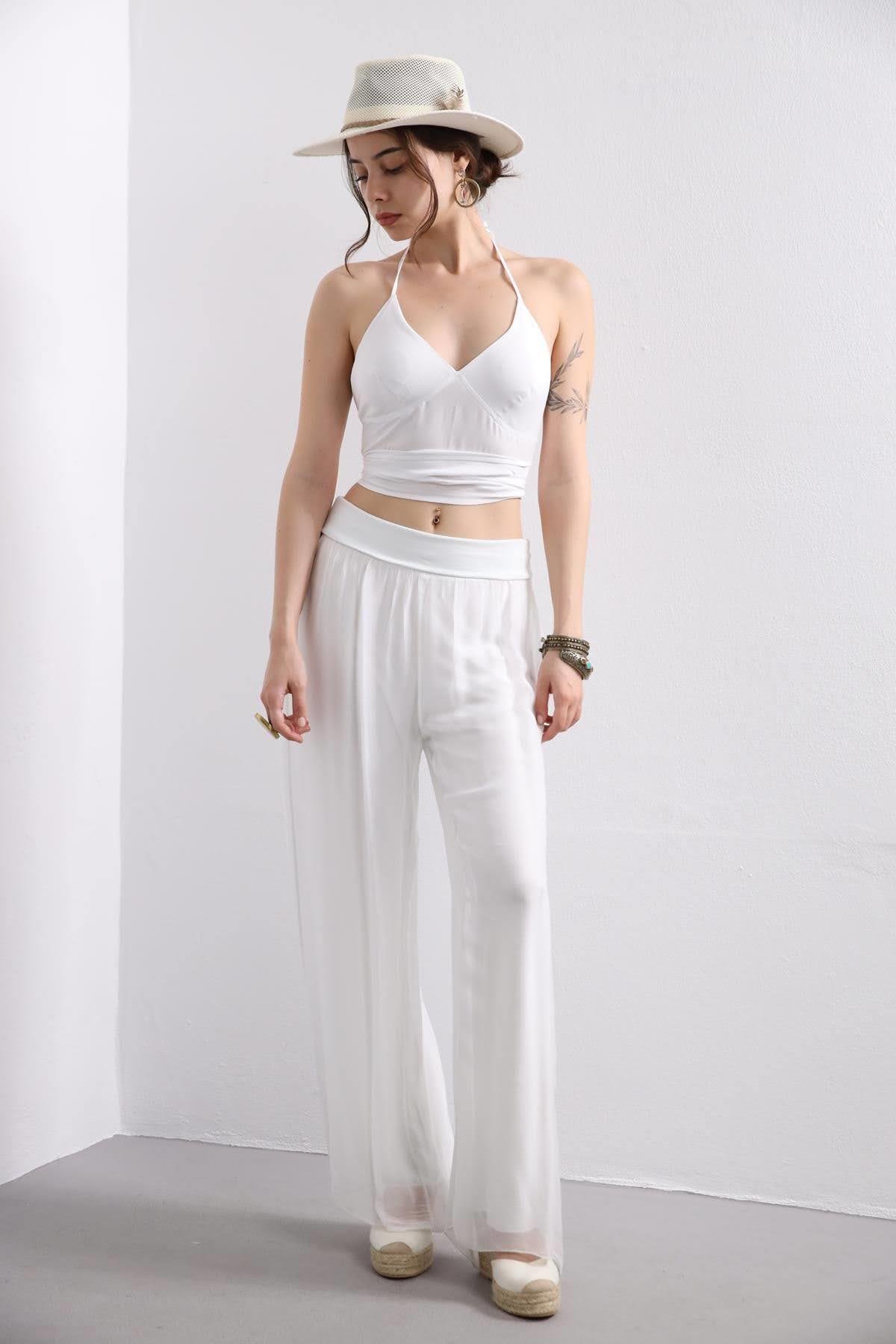 White silk trousers