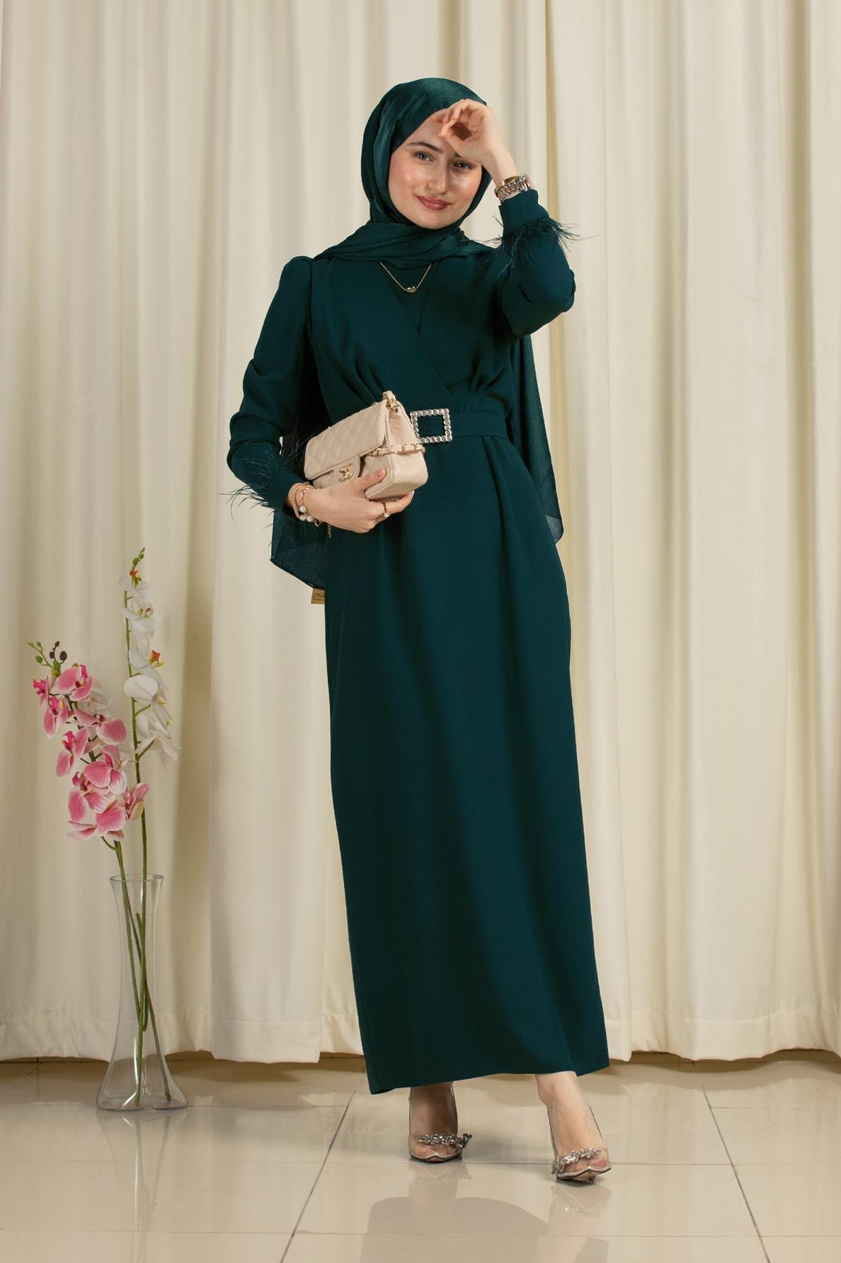 Evening dress with feather details and Venus sleeves - petrol color
