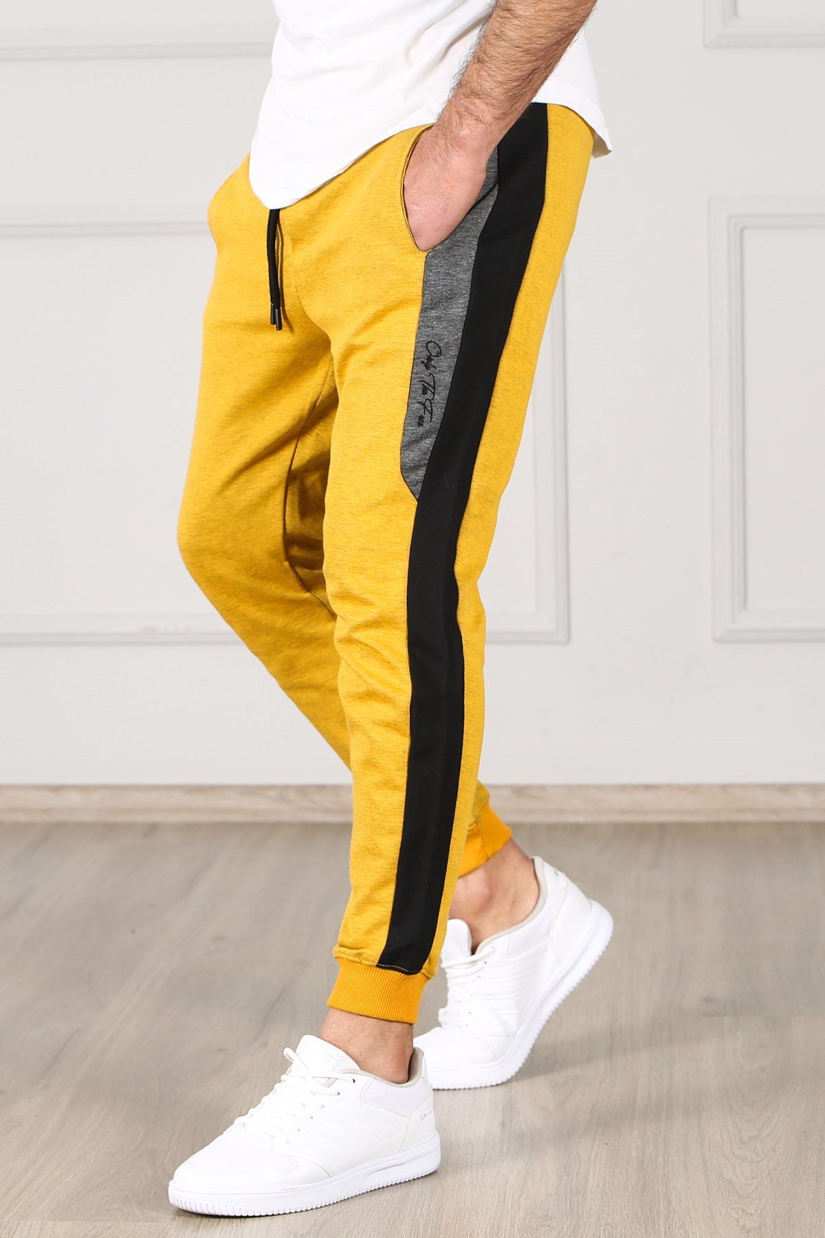 Black yellow store stripe joggers