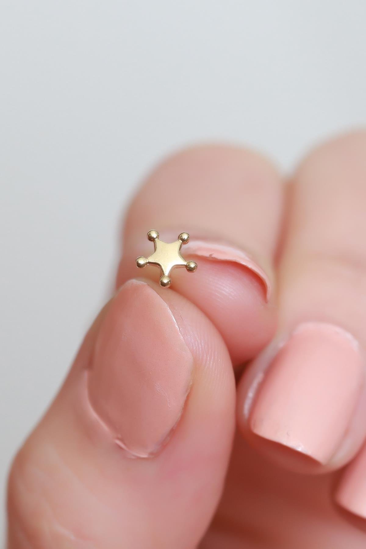 Star tragus piercing deals