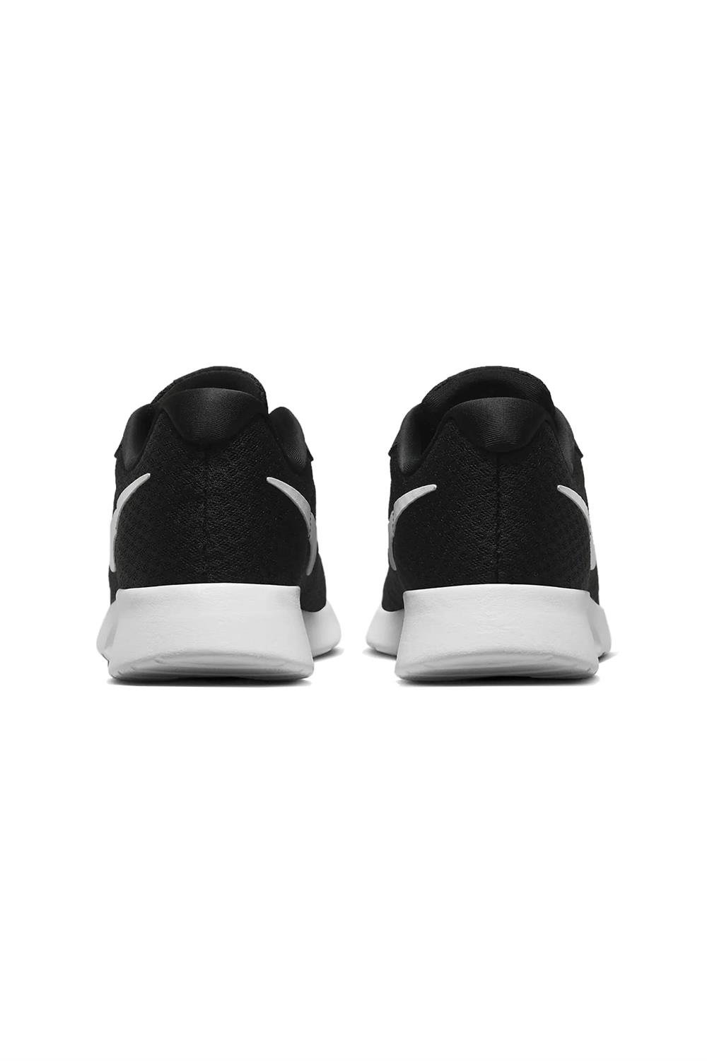 Nike tanjun mens wide sale