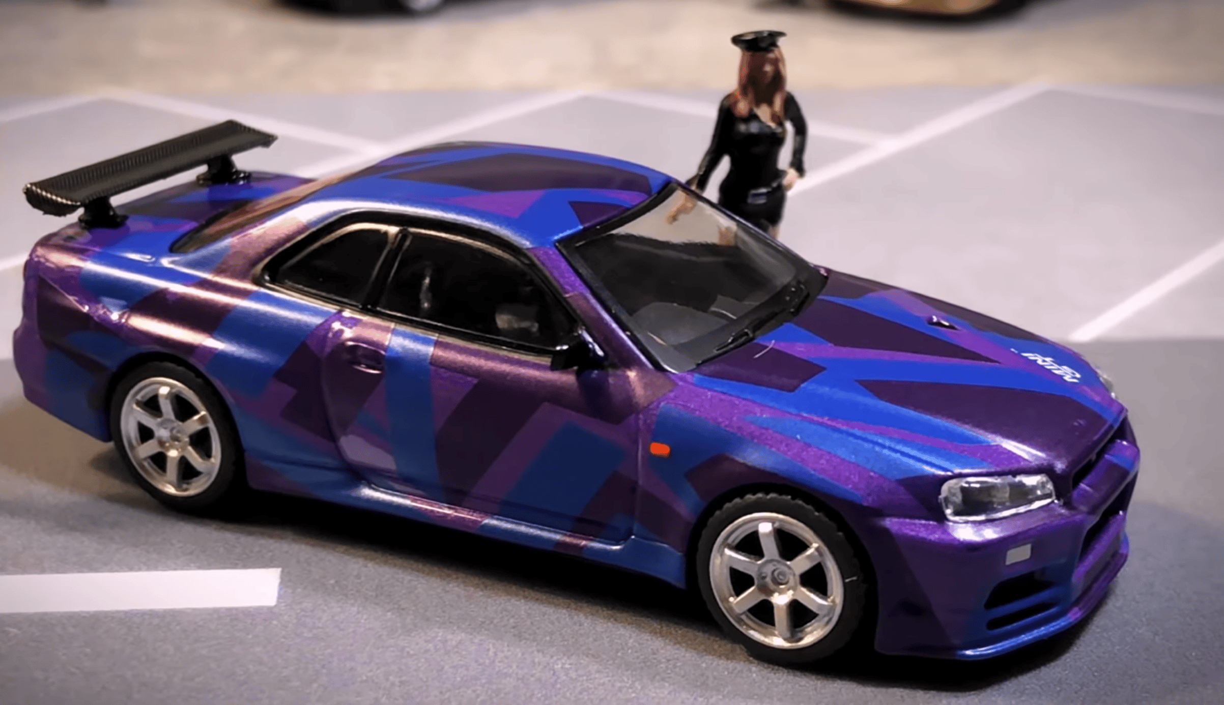 Mini GT 1:64 Nissan Skyline GT-R (R34) V-Spec II Digital Camouflage  Anniversary