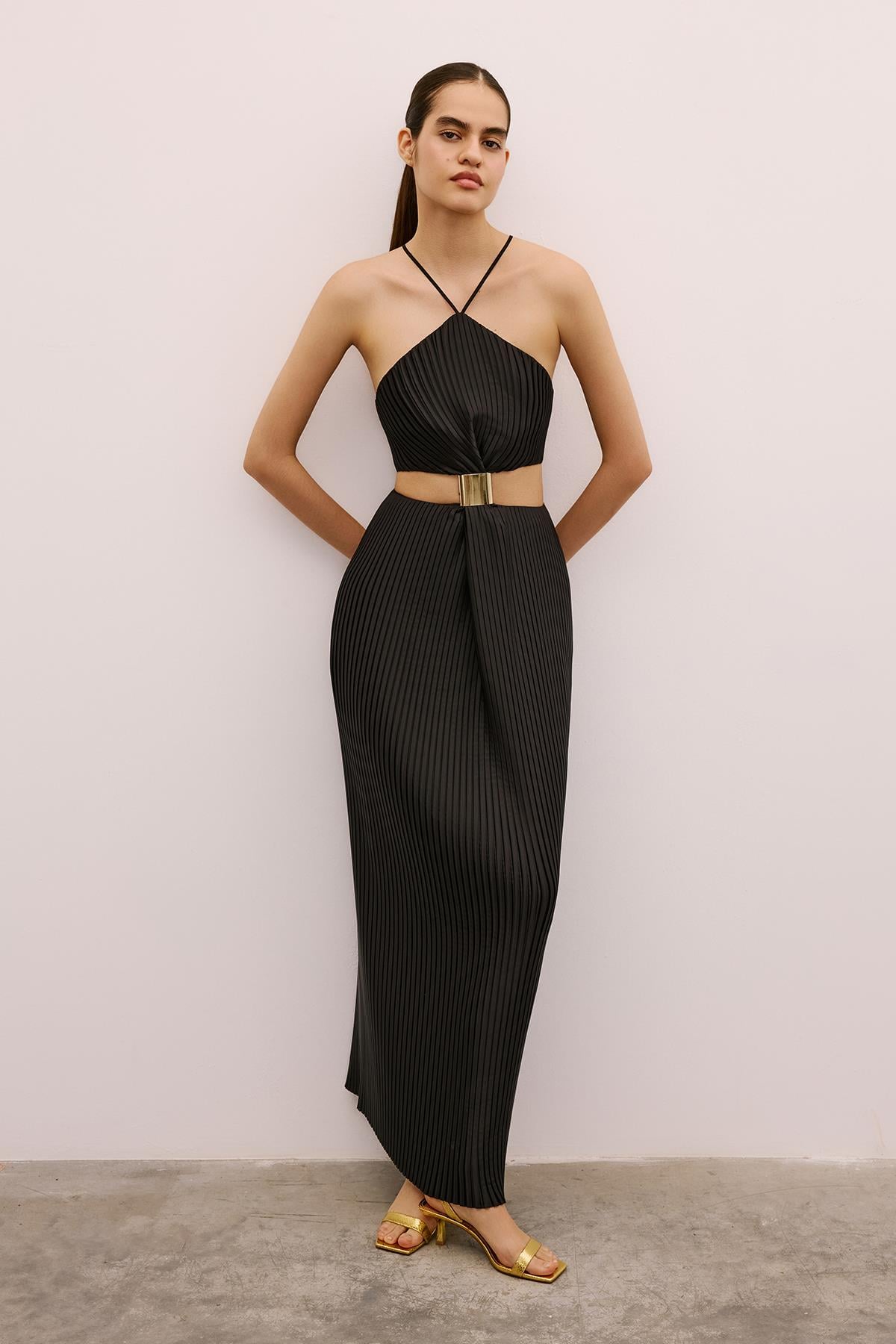 Long Black Dress with Gold Accessories