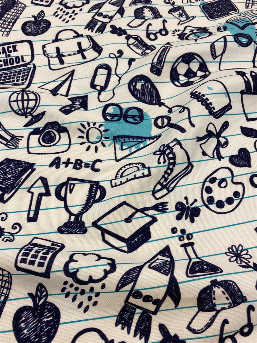 Çizgili Defter Zeminli Lacivert Renkli Şekiller Desenli Dijital Baskılı Kumaş