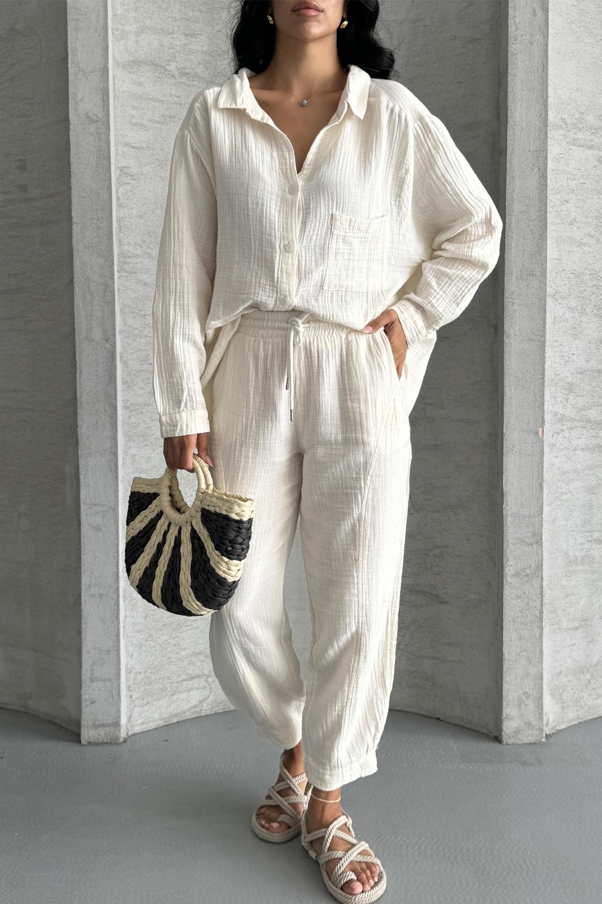 Coastal Muse Müslin Kumaş Oversize İkili TakımCoastal Muse Müslin Oversize Takım – Rahat ŞıklıkTAKIMİSTANGÜL BUTİK