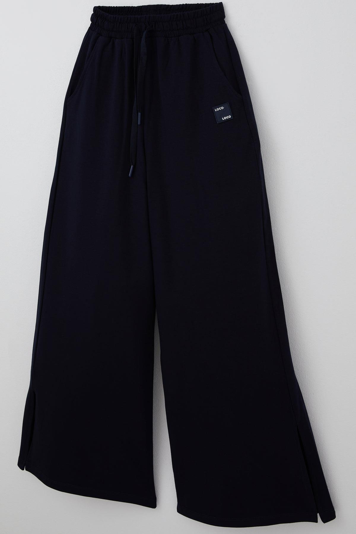 Locoloco Kız Çocuk Eşofman Altı Geniş Paça Yırtmaçlı Bağcıklı Arma Detaylı Lacivert (9-14 Yaş)