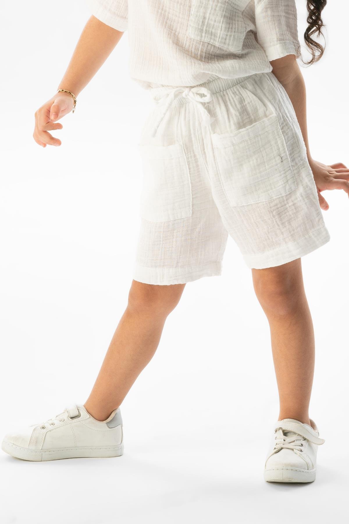 Batı Cep Detaylı Yazlık Müslin Kız Çocuk Şort Beyaz Byz