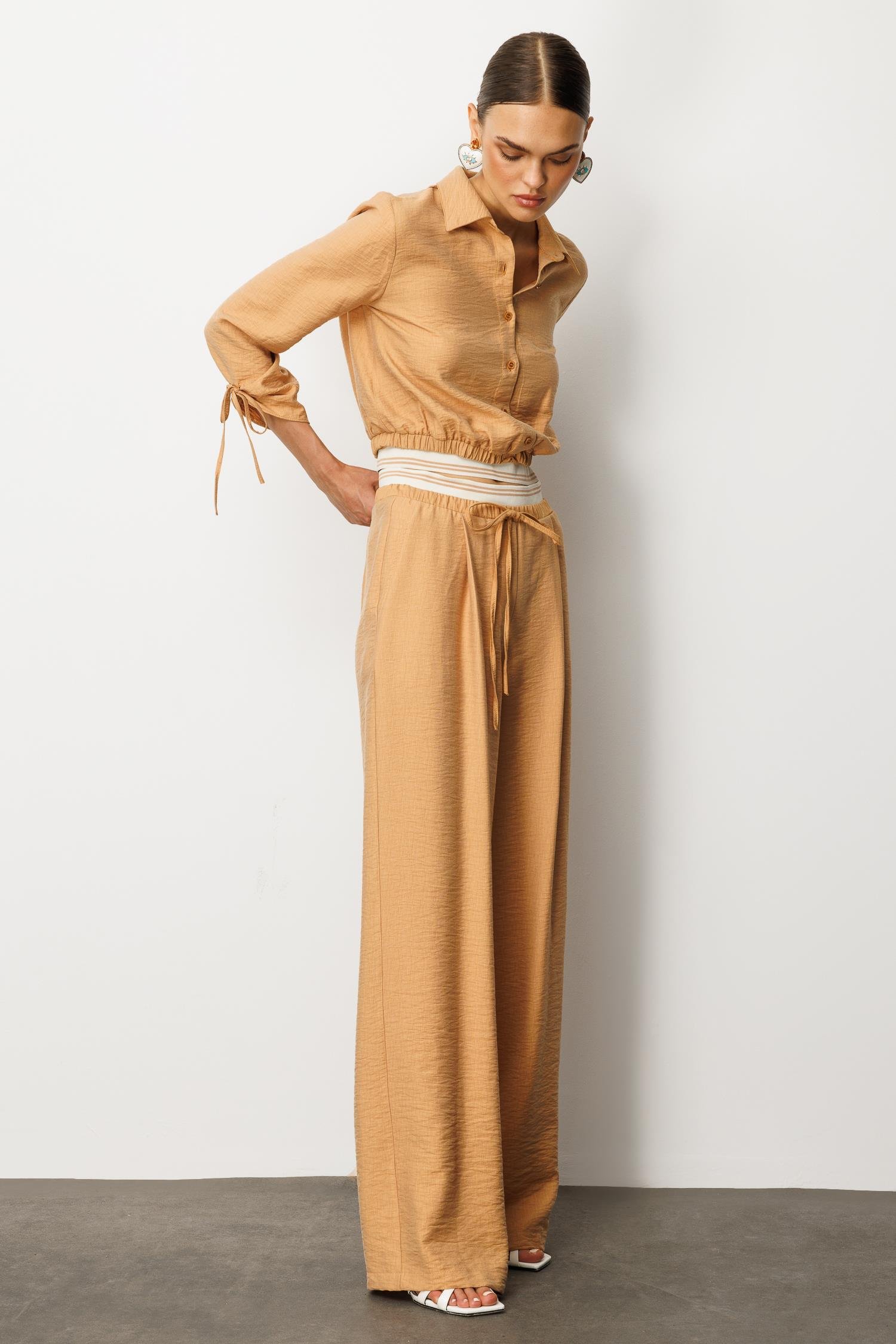 Modailgi  Beli Lastik ve Ribana Detaylı Bol Paça Pileli Yandan Cepli Yüksek Bel Pantolon - 10037 Tarçın