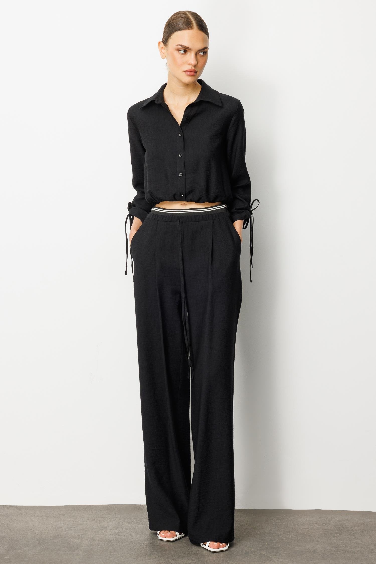 Modailgi  Beli Lastik ve Ribana Detaylı Bol Paça Pileli Yandan Cepli Yüksek Bel Pantolon - 10037 Siyah