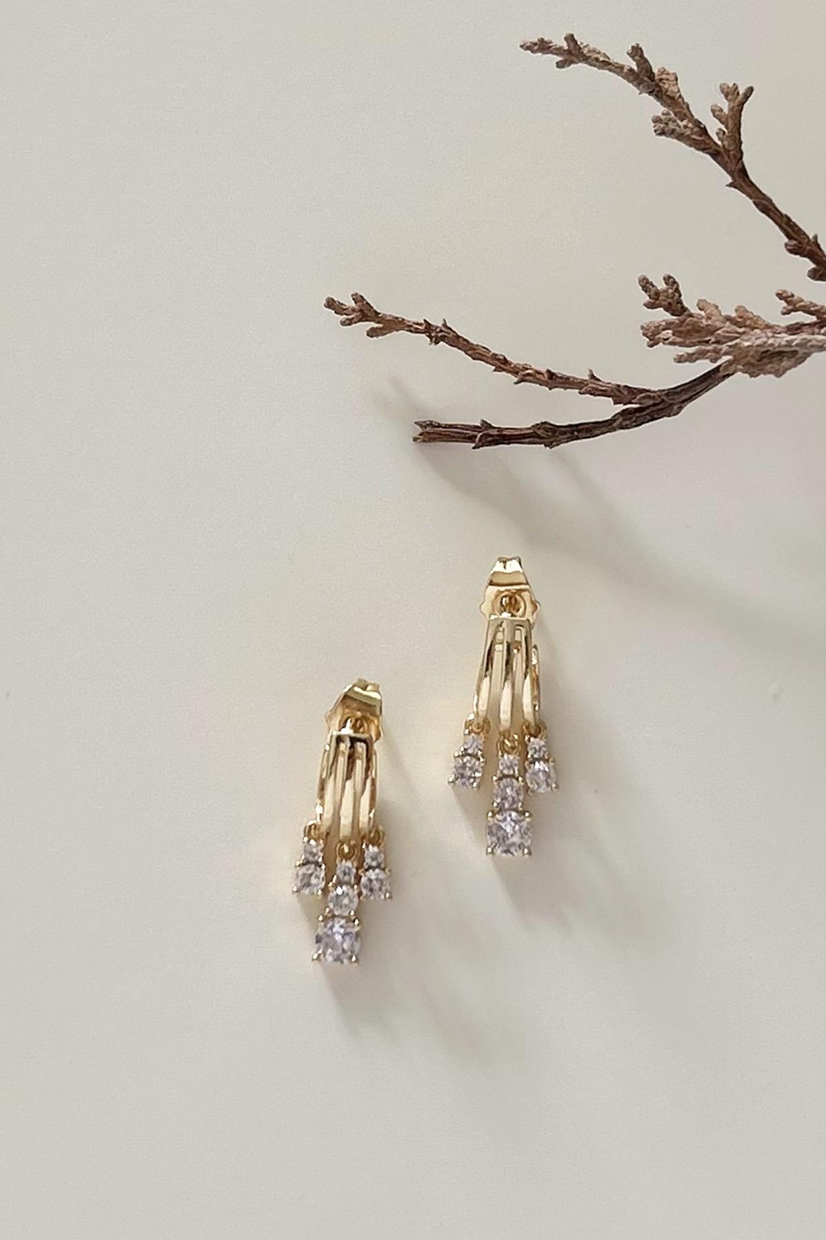 Üç Sıra Zirkon Taşlı Sallantılı Çelik Küpe