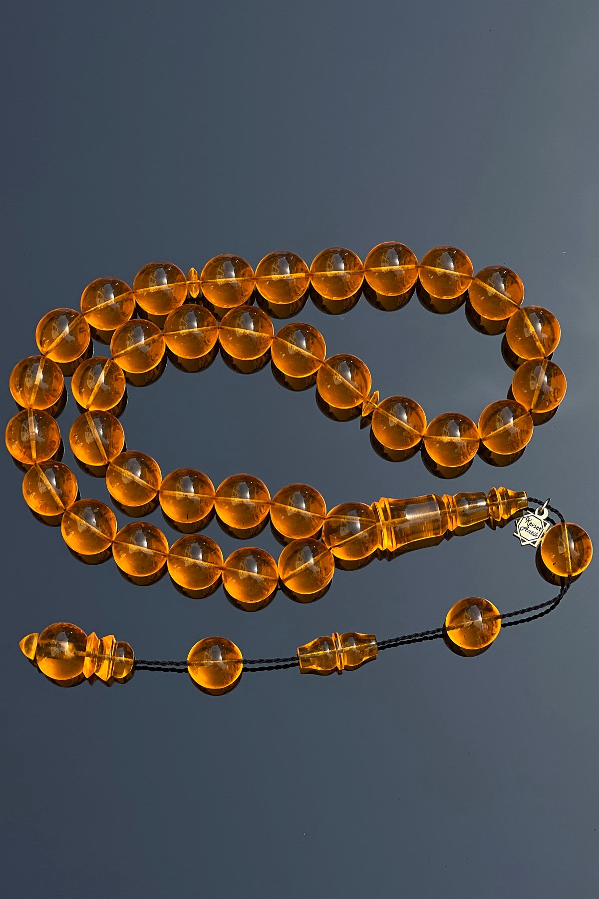 Dev Uçak Camı TesbihDev Uçak Camı Tesbih - Kevser AntikSıkma-Ateş Kehribar Tesbihler