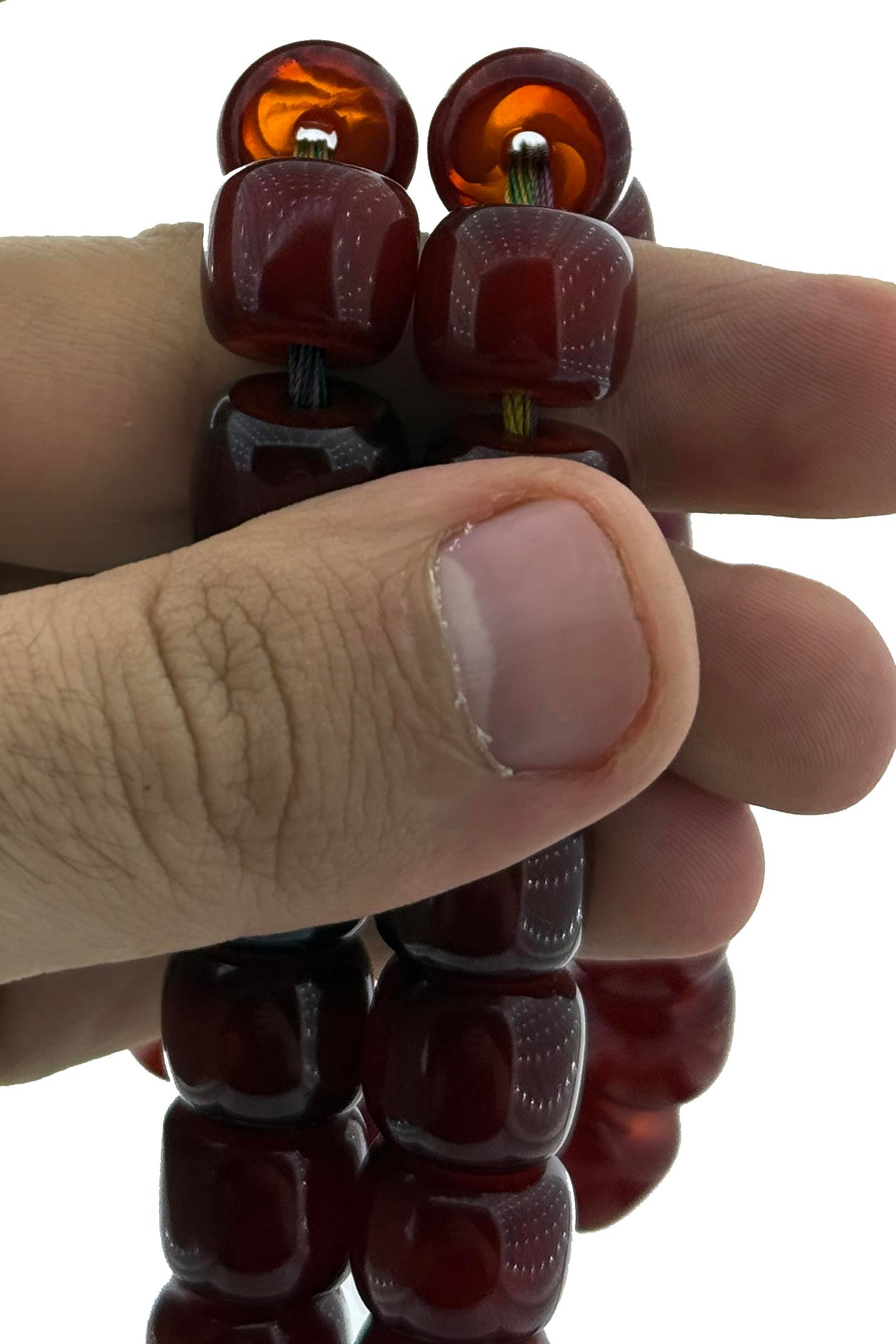 Dönem Ustalığıyla Yapılmış Vişne Sıkma Kehribar TesbihDönem Ustalığıyla Yapılmış Vişne Sıkma Kehribar Tesbih - Kevser AntikOsmanlı Kehribar Tesbihler