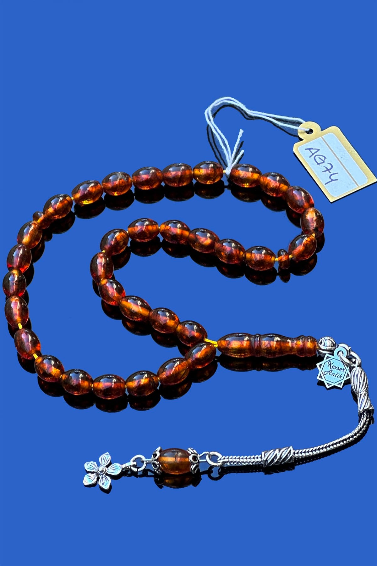 Fosilli Damla Kehribar TesbihFosilli Damla Kehribar Tesbih - Kevser AntikDamla Kehribar Tesbihler