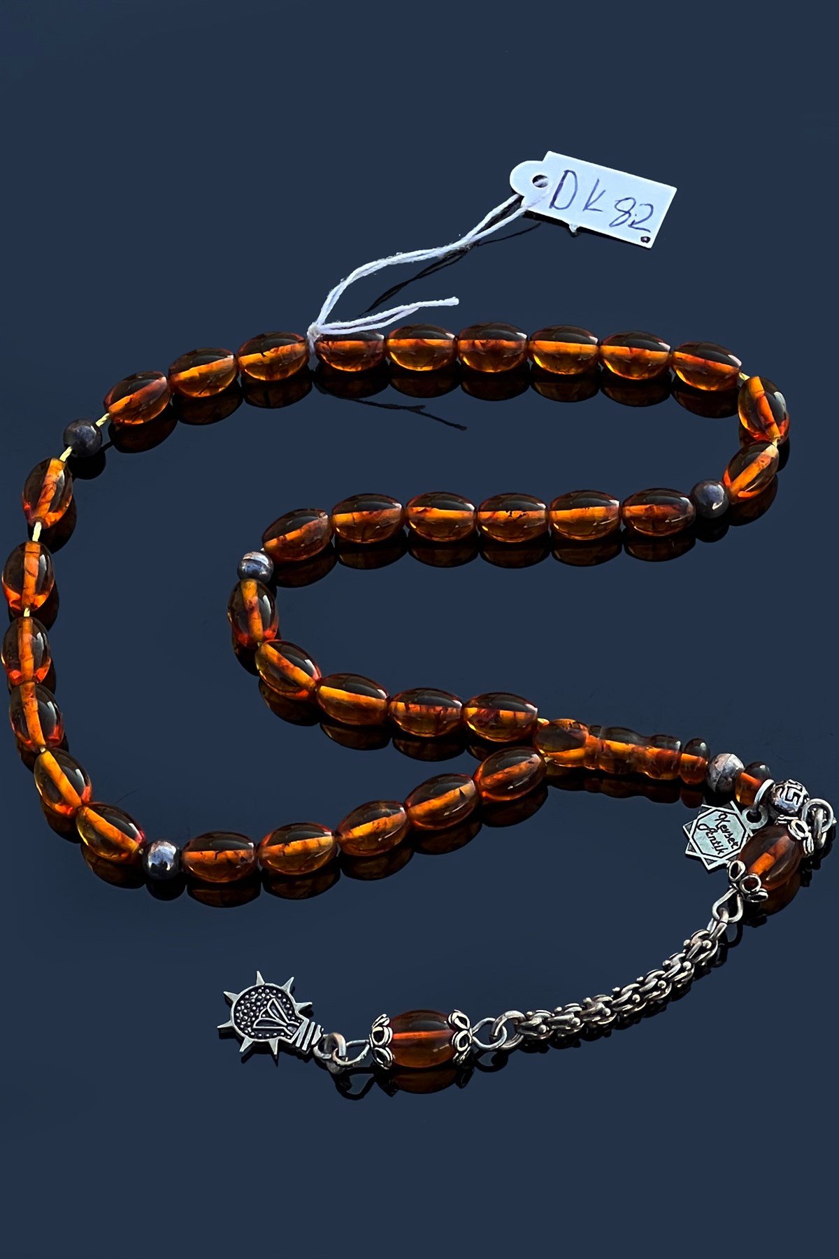 Fosilli Damla Kehribar TesbihFosilli Damla Kehribar Tesbih - Kevser AntikDamla Kehribar Tesbihler