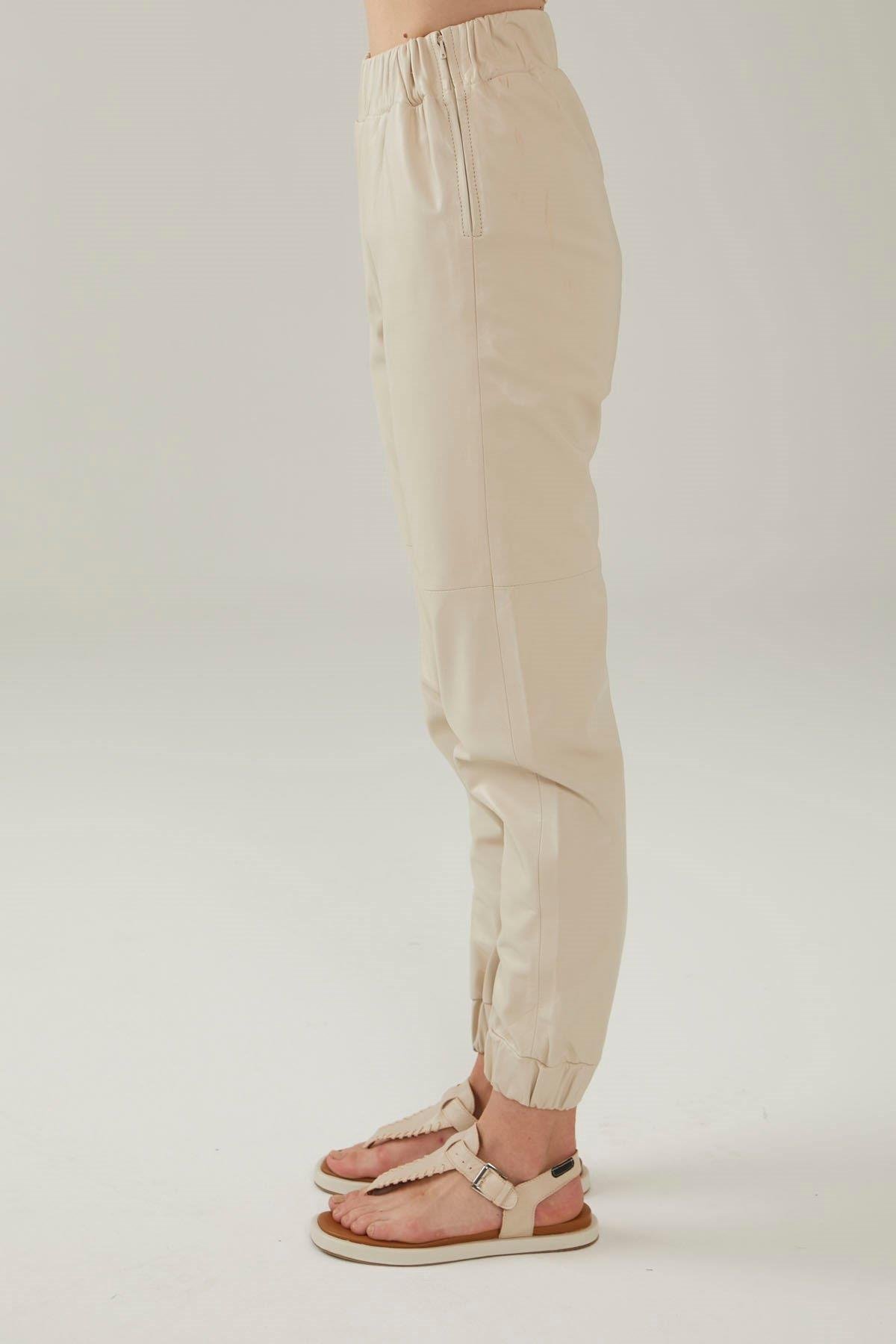 Bej Yüksek Bel Paçası Beli ve Paçası Lastikli Cepsiz Hakiki Deri Pantolon