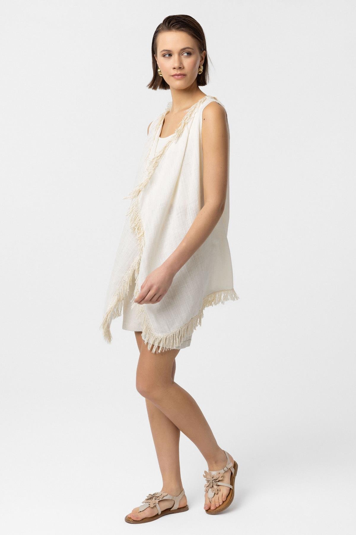 Krem Asimetrik Kesim Püsküllü Pamuklu Yelek