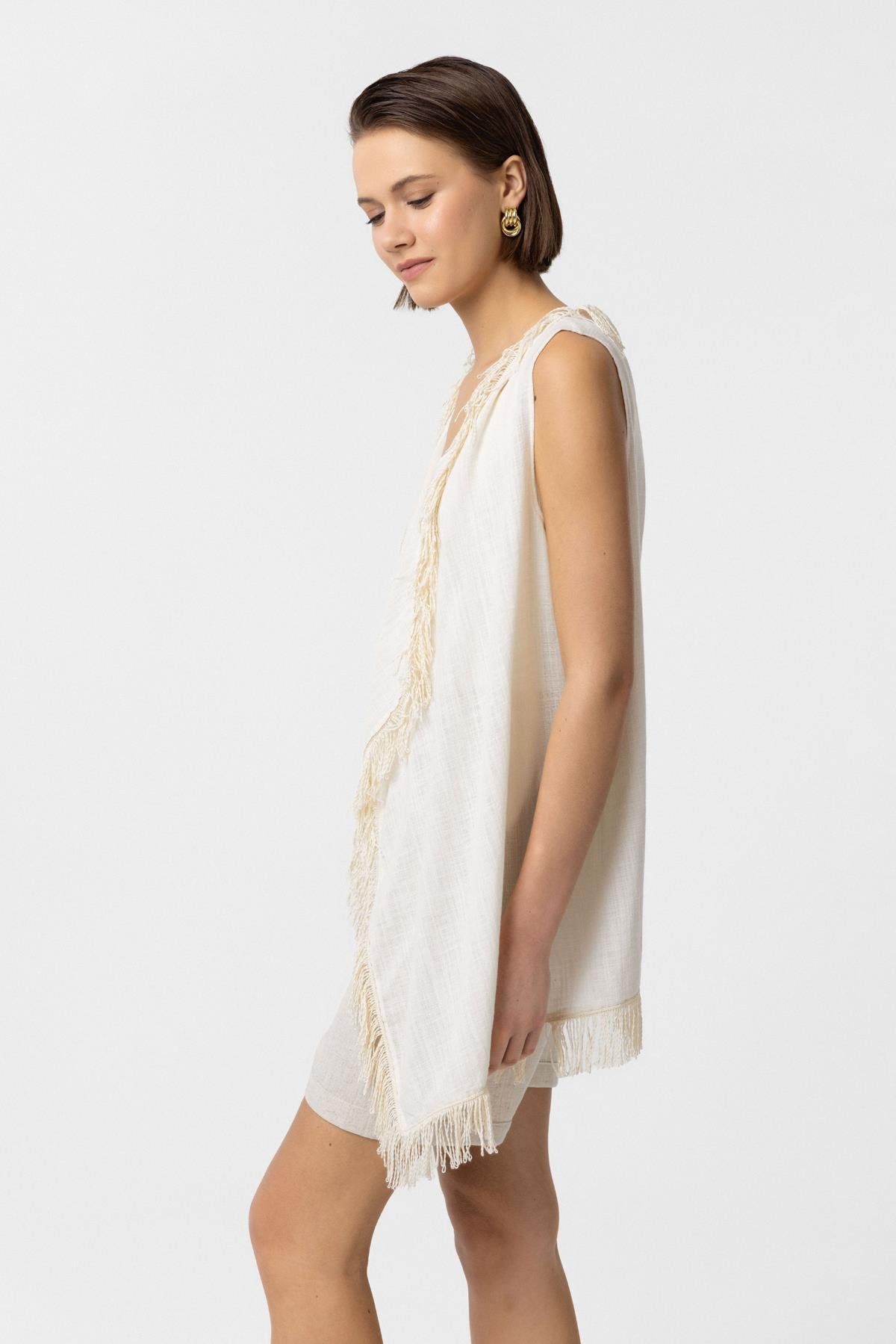 Krem Asimetrik Kesim Püsküllü Pamuklu Yelek