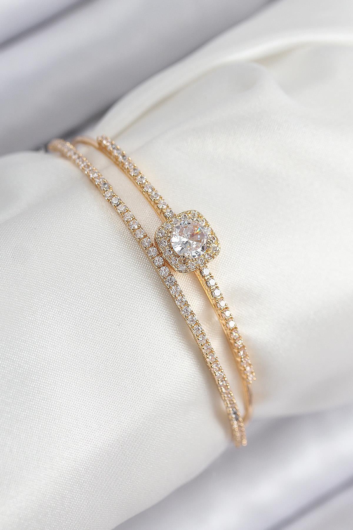 Pirinç Zirkon Taşlı Baget Model Gold Renk Kadın Bileklik