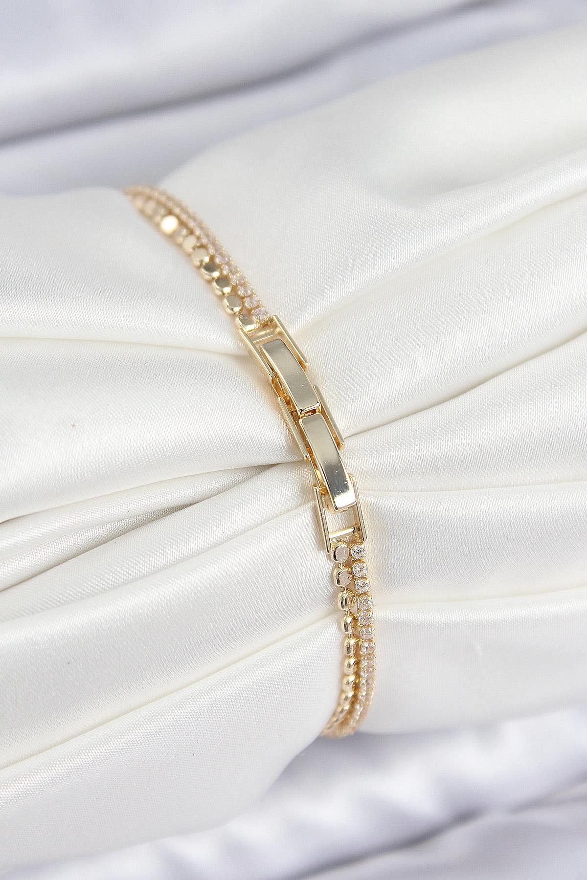 Pirinç Zirkon Taşlı Ezme Zincirli Sıralı Model Gold Renk Kadın Bilekilk