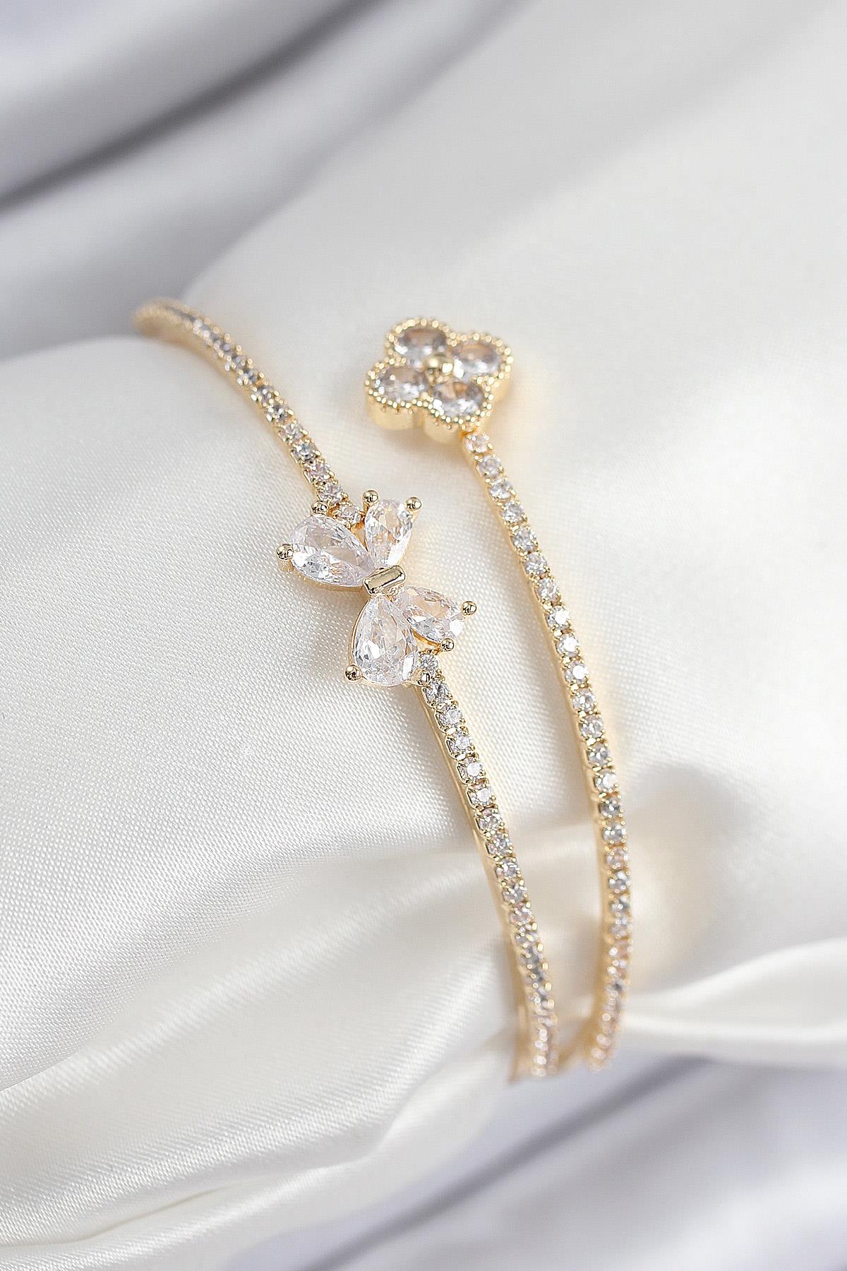 Pirinç Zirkon Taşlı Fiyonk Ve Yonca Model Gold Renk Kadın Bileklik