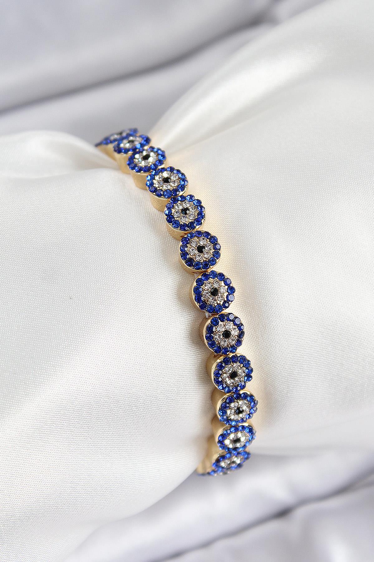 Pirinç Zirkon Taşlı Lacivert Nazar Model Gold Renk Lastikli Kadın Bileklik