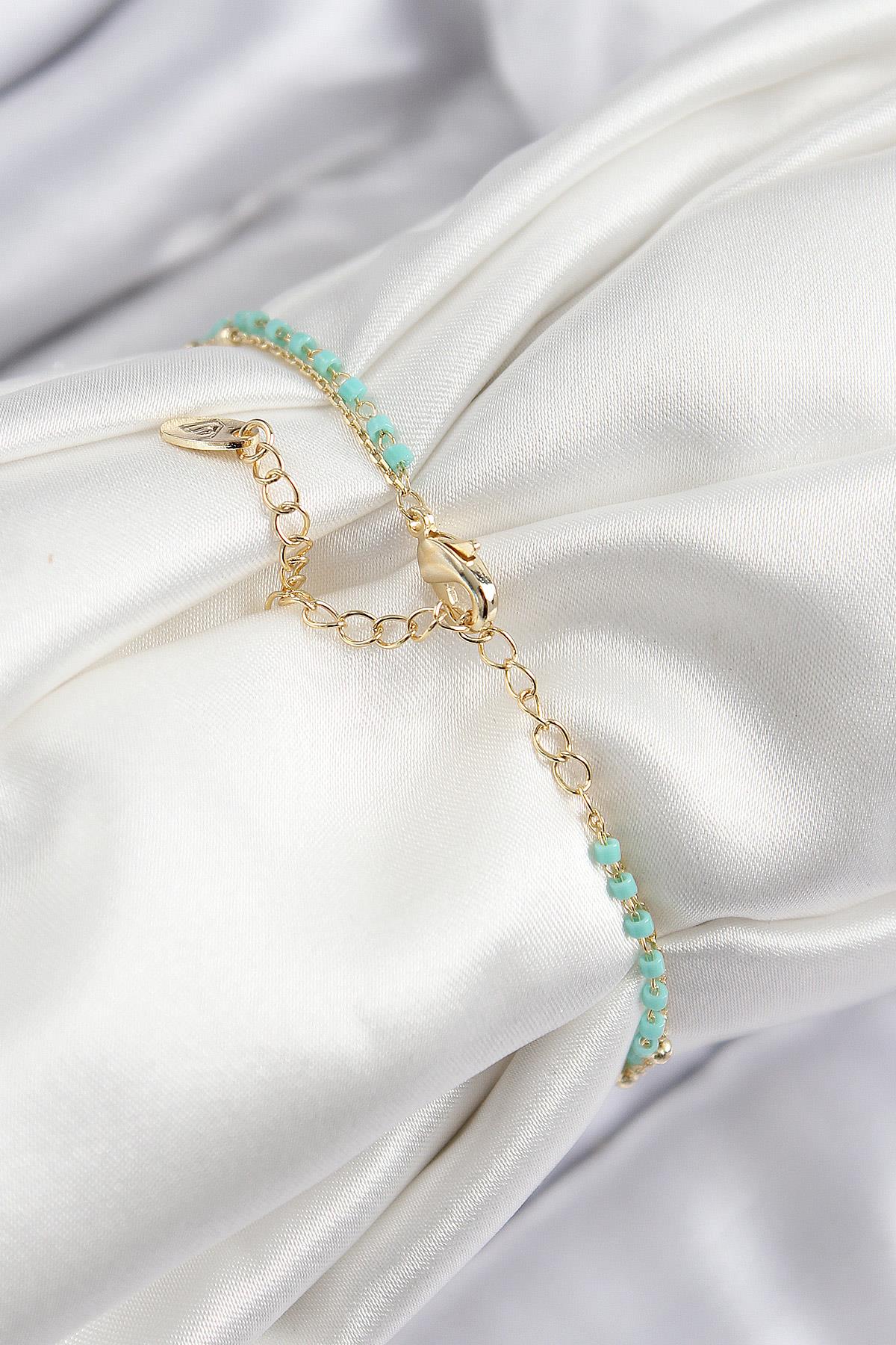 Pirinç Zirkon Taşlı Mavi Boncuklu Model Gold Renk Kadın Bileklik