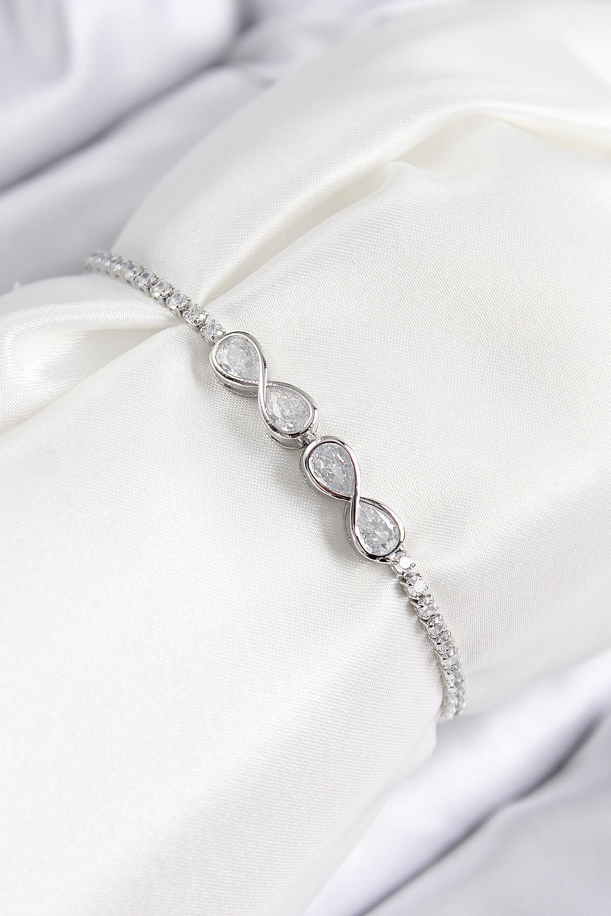 Pirinç Zirkon Taşlı Sonsuzluk Model Gümüş Renk Asansörlü Kadın Bileklik