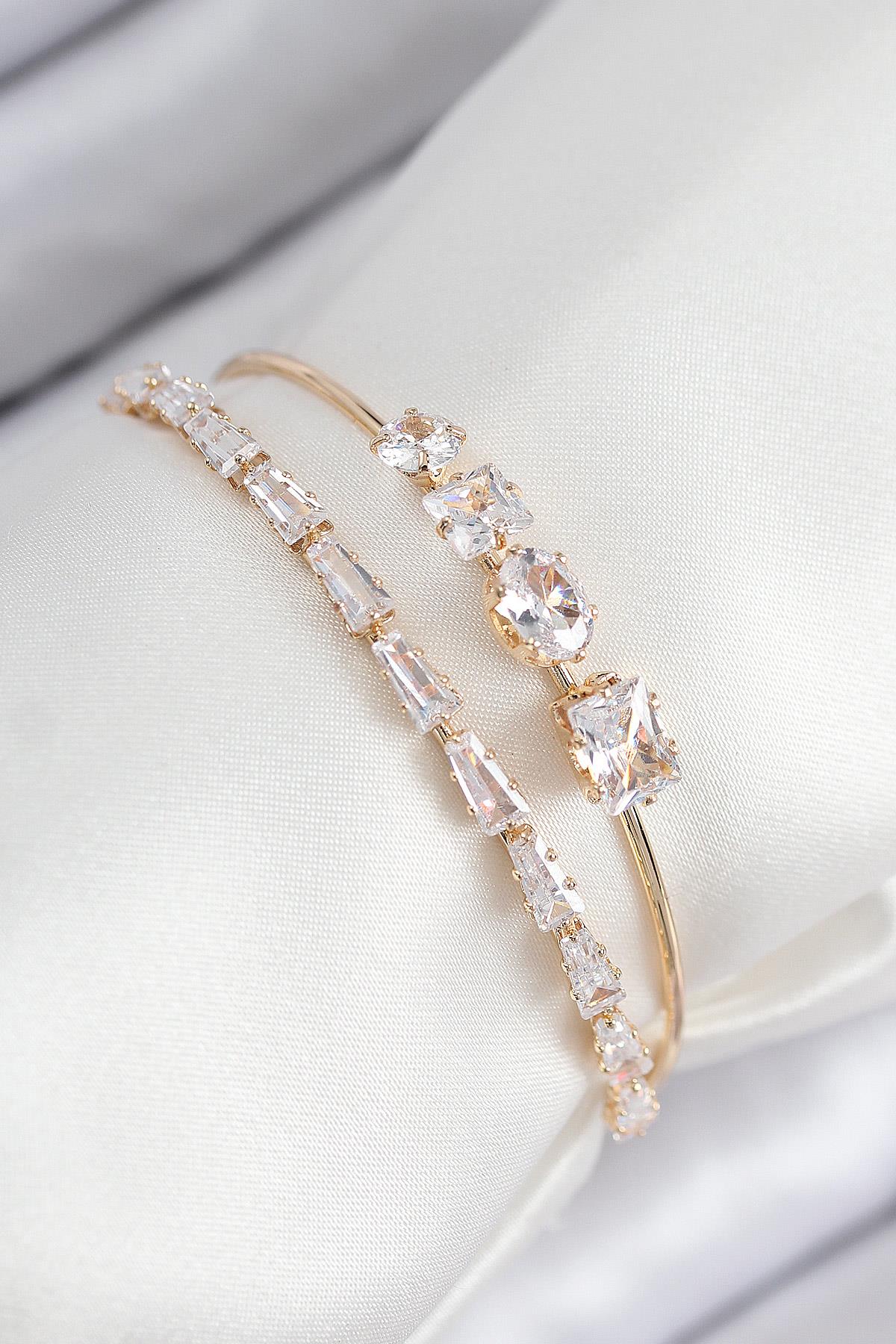 Pirinç Zirkon Taşlı Su Yolu Model Gold Renk Kadın Bileklik