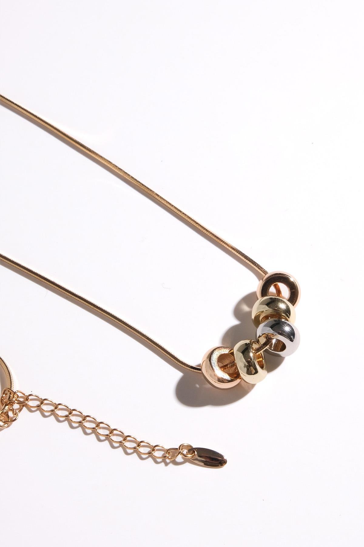 Mio Gusto Altın Renk İnsan Figürlü Taşlı Kadın Kolye Modelleri