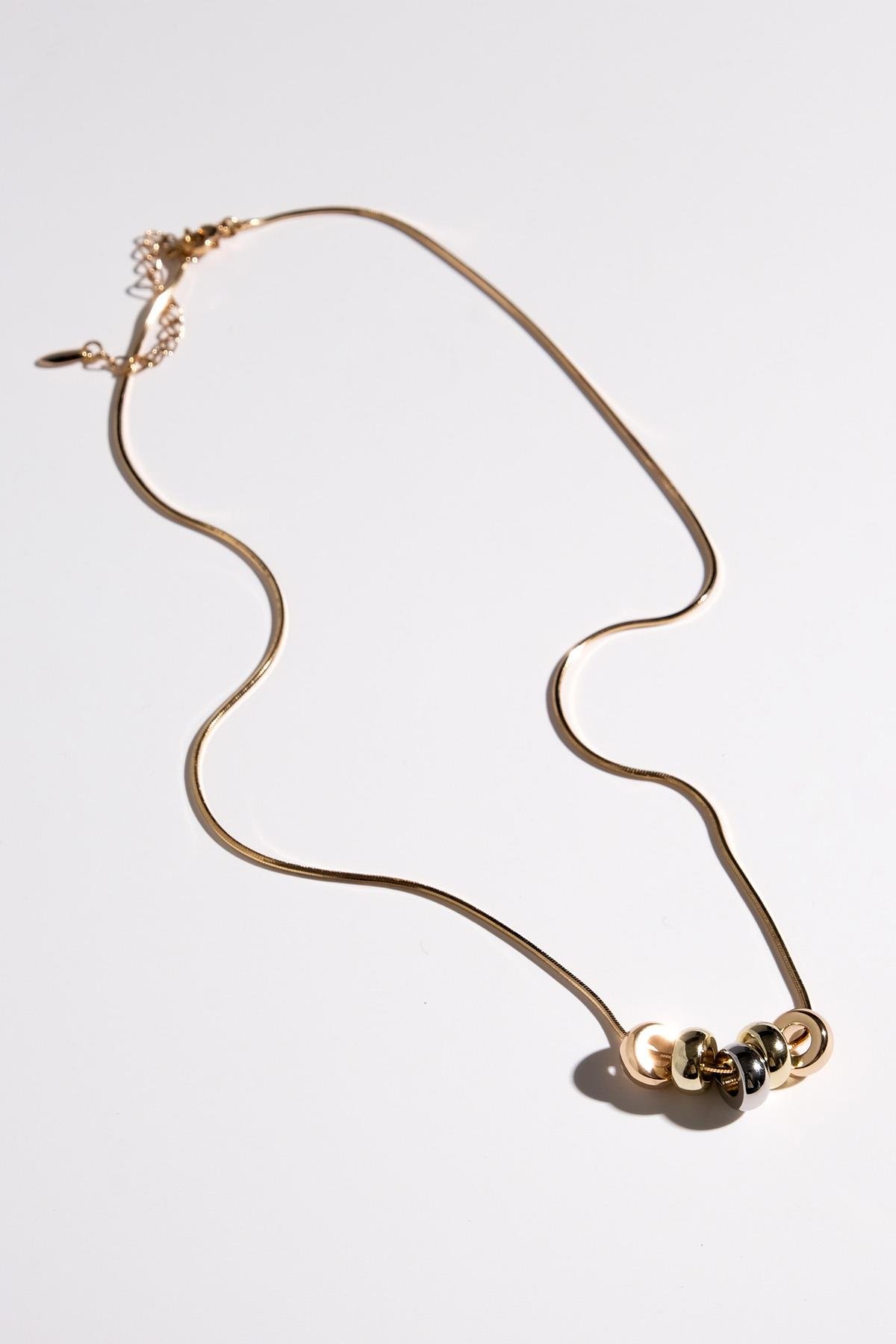 Mio Gusto Altın Renk İnsan Figürlü Taşlı Kadın Kolye Modelleri