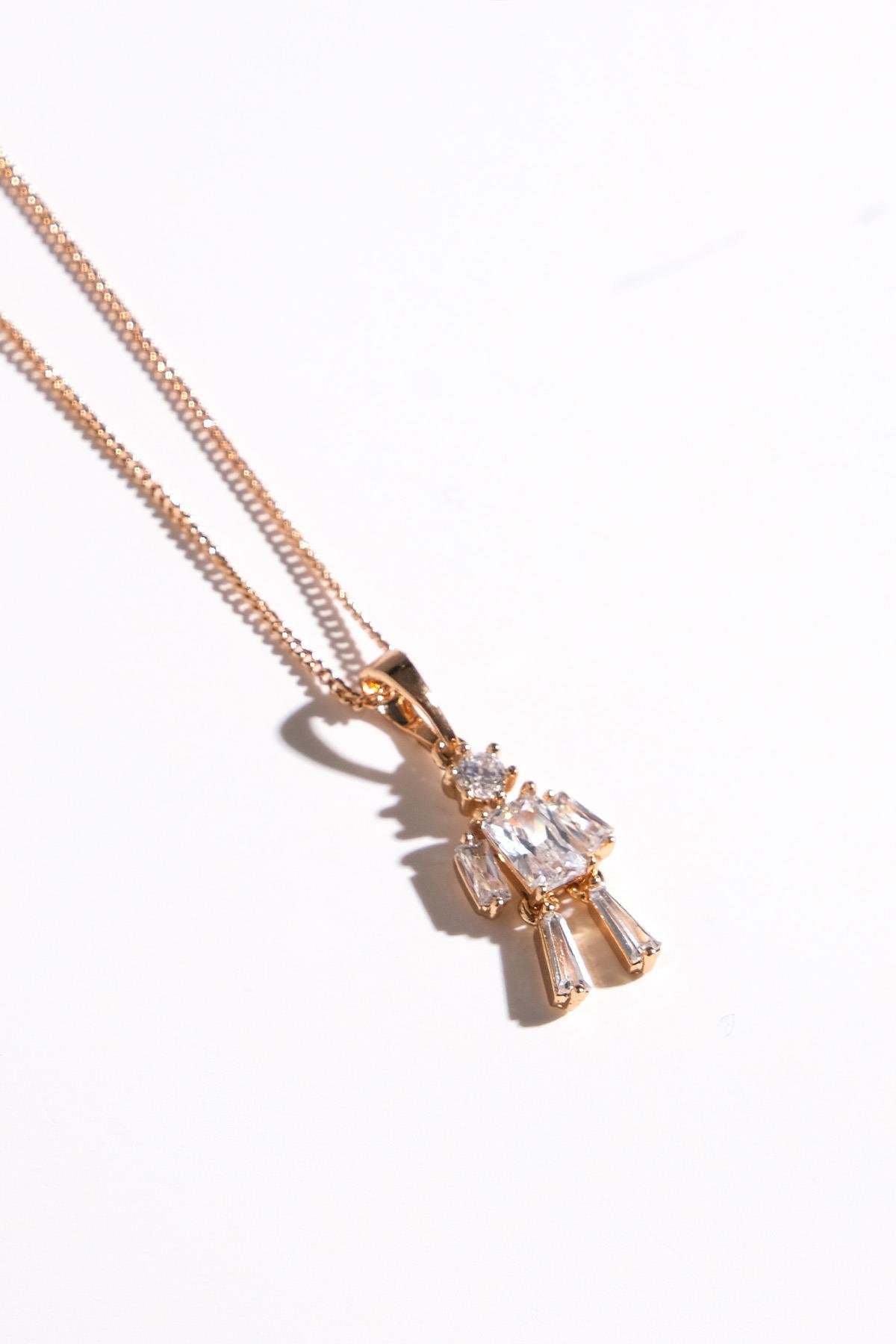 Mio Gusto Altın Renk Su Damlası Kadın Kolye Modelleri