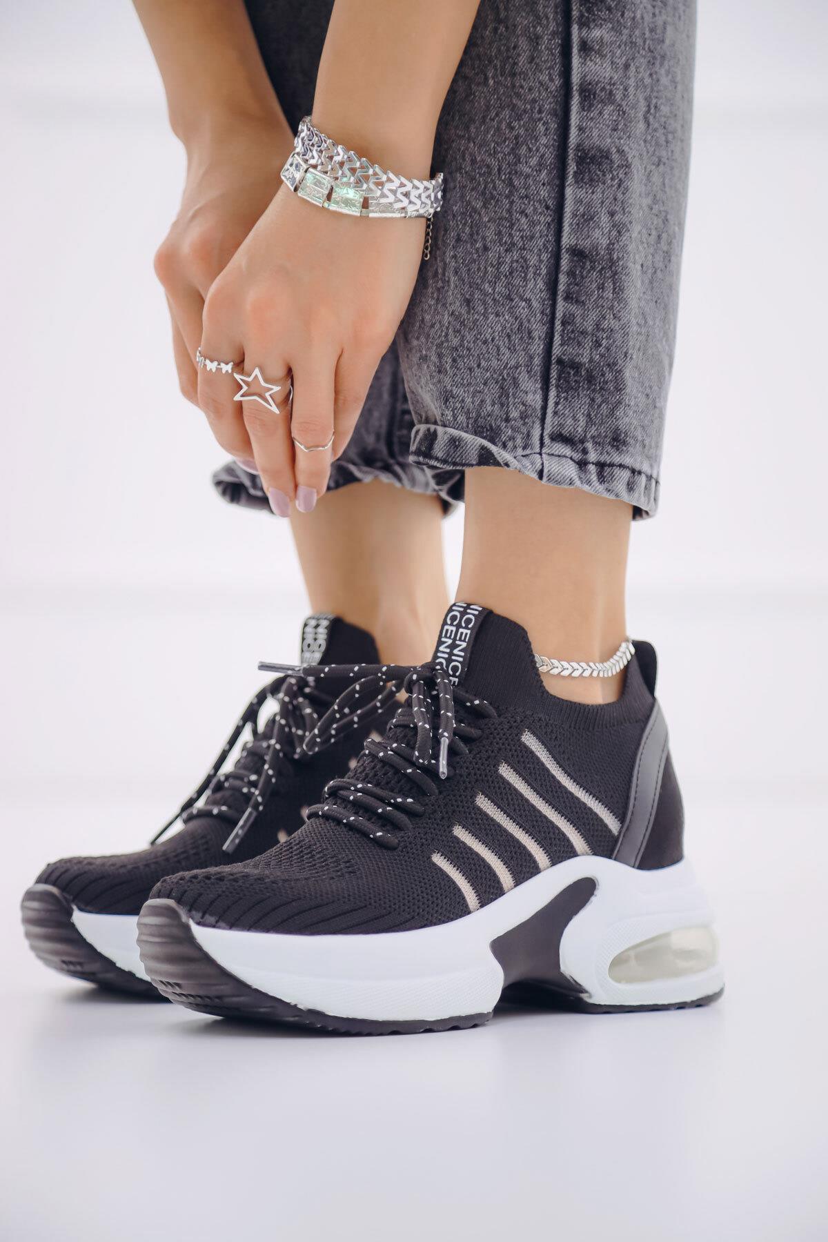 gizli-dolgu-topuklu-kadin-siyah-spor-a-c-9aed.jpg