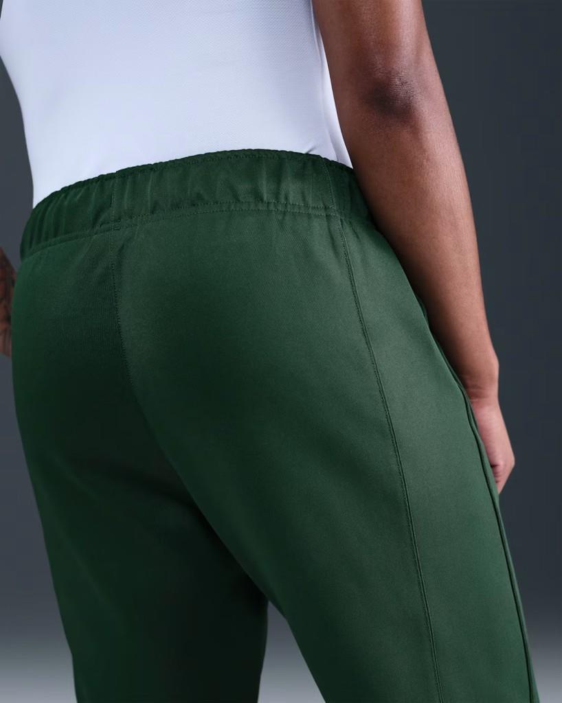 NikeCourt FZ6509-323 Heritage Windrunner Normal Belli Kadın Tenis Pantolonu - Yeşil