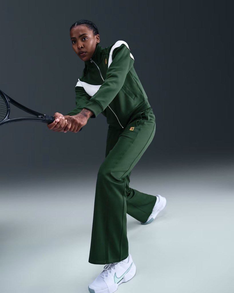 NikeCourt FZ6509-323 Heritage Windrunner Normal Belli Kadın Tenis Pantolonu - Yeşil