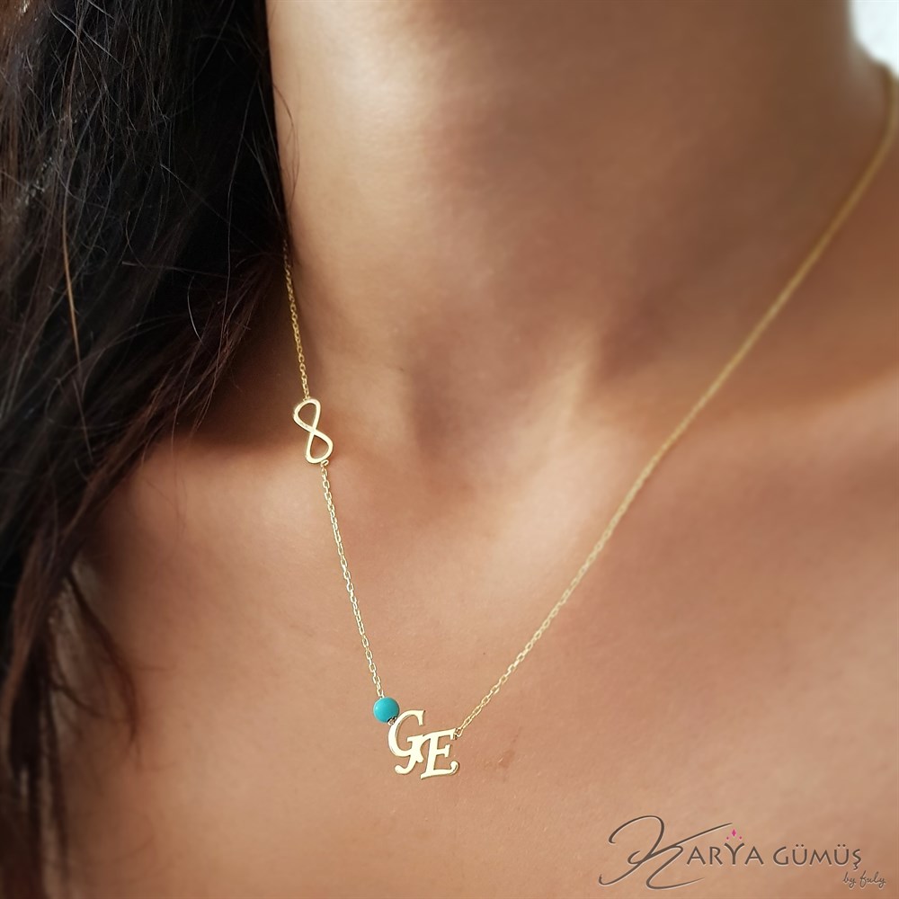 TURKUAZ TAŞLI ÇAPRAZ İKİLİ HARF SONSUZLUK GÜMÜŞ KOLYE