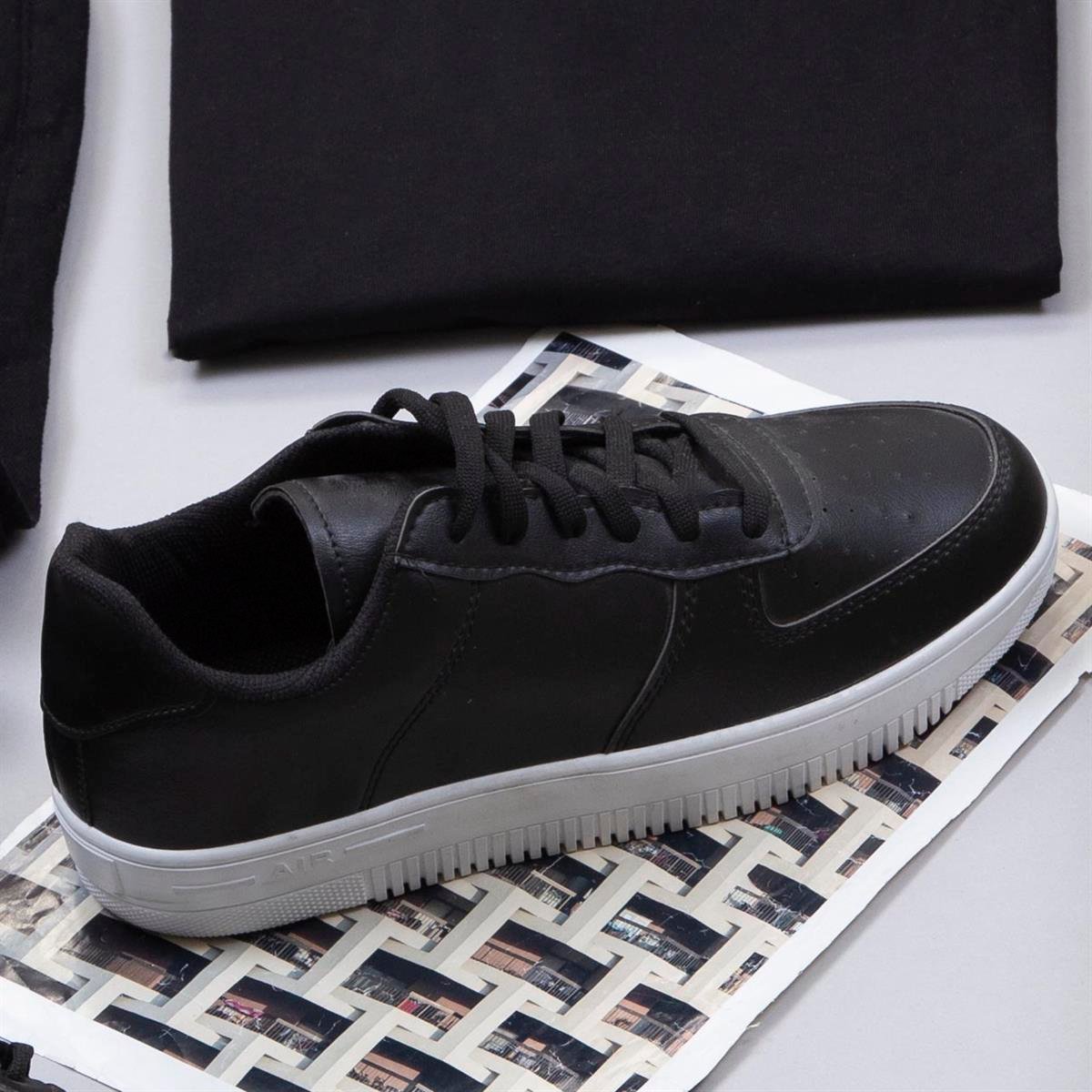 Bej Şişme Yelek Tişört Pantolon Ayakkabı Kombin