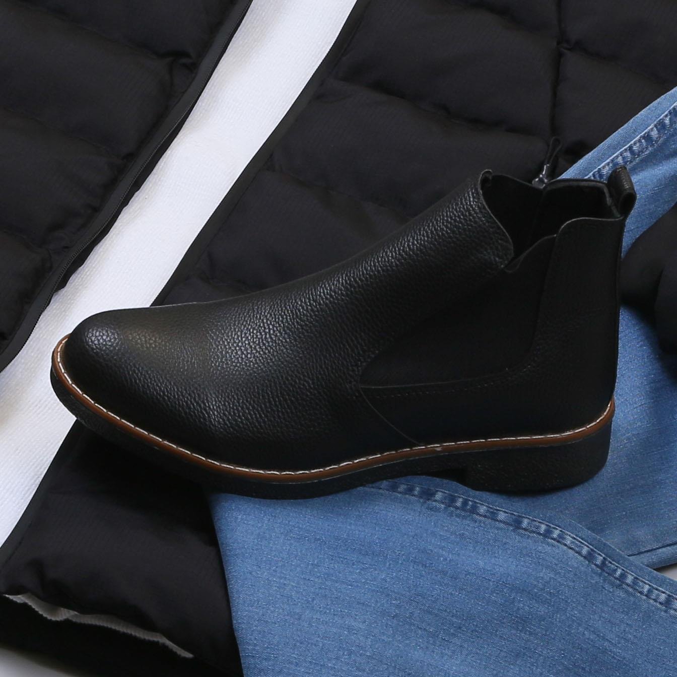 Siyah Şişme Mont Boğazlı Body Pantolon Bot Kombin