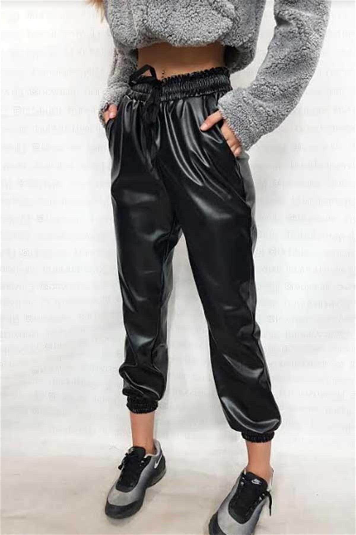 Beli Paçası Lastikli Deri Pantalon
