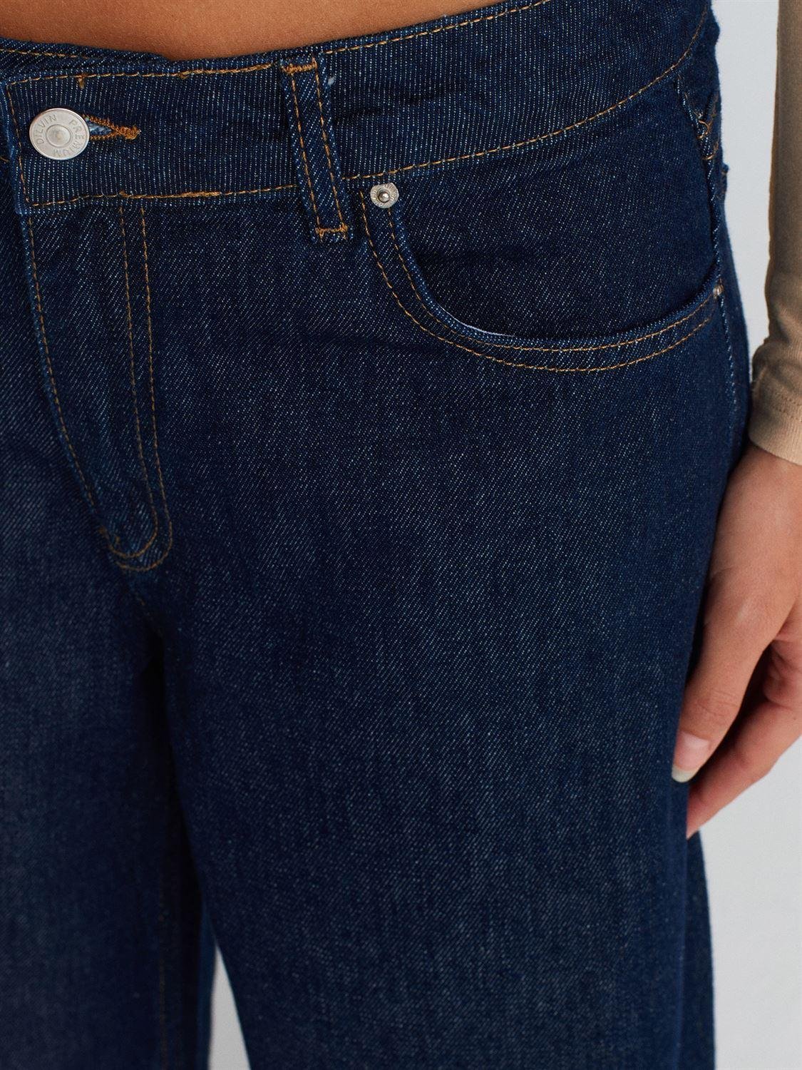 Paçası Dikişsiz Geniş Denim PantolonÇOK SATANLAR
