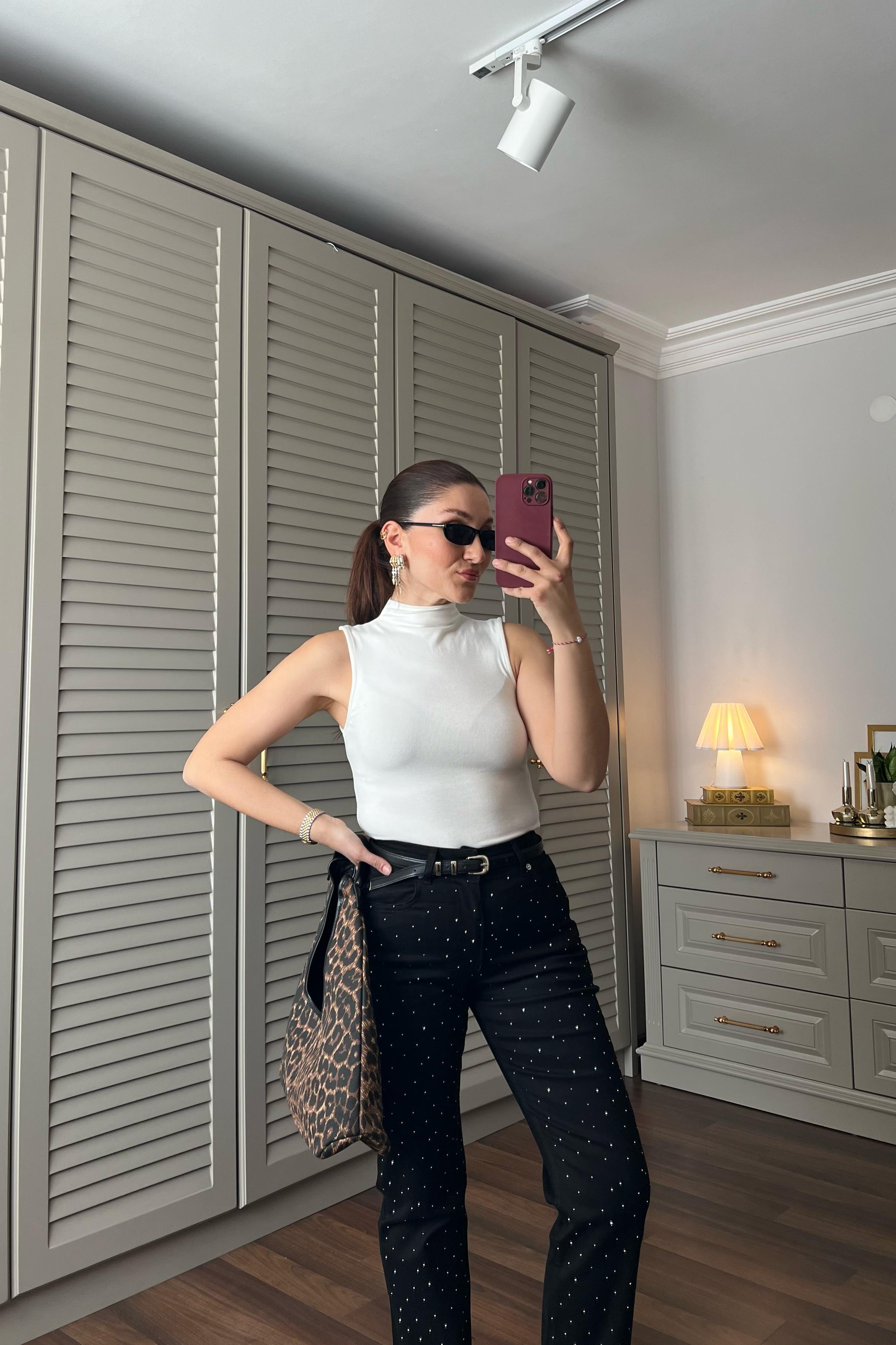 YUMUŞAK DOKULU KOLSUZ BODY/0580