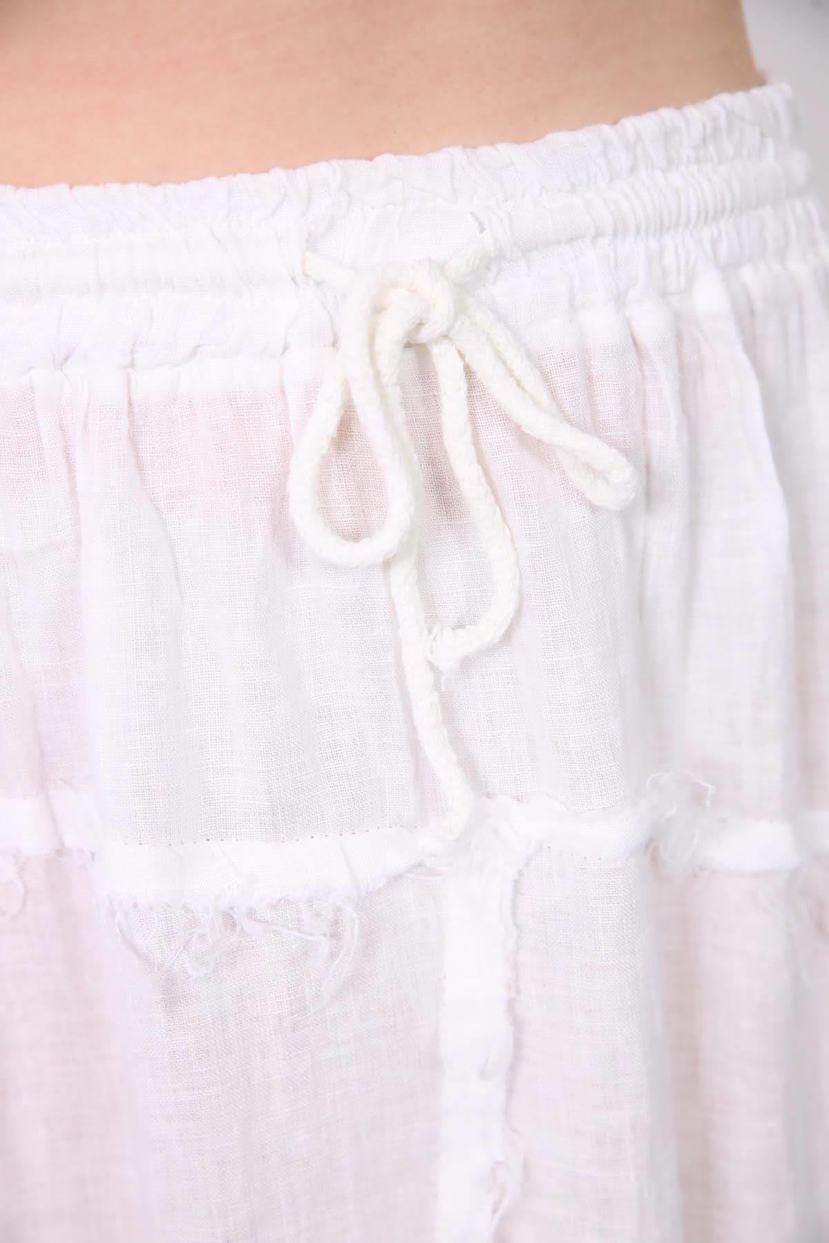 Beyaz Asimetrik Püsküllü Dikiş Detaylı Keten Etek - Şaman Butik Beyaz Asimetrik Püsküllü Dikiş Detaylı Keten Etek