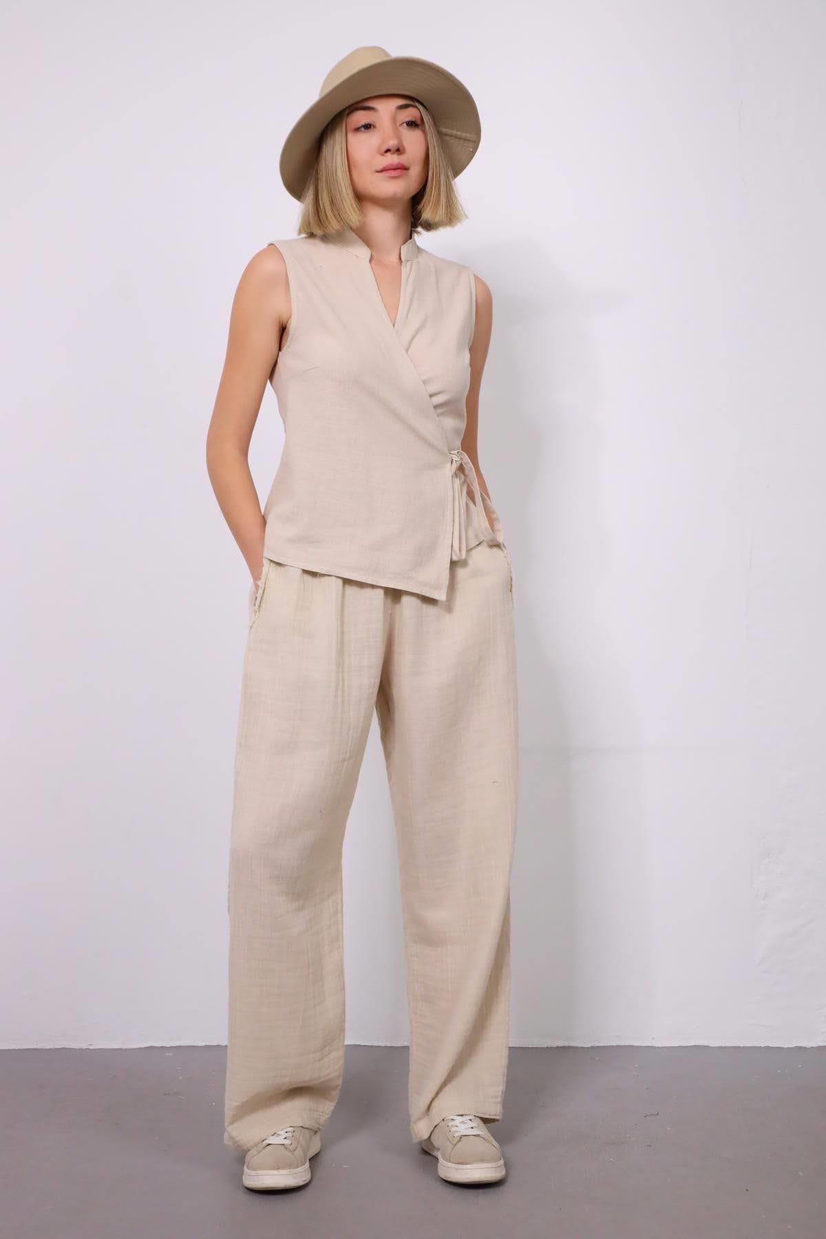 Bej Cebi Püskül Detaylı Müslin Pantolon - Şaman Butik Bej Cebi Püskül Detaylı Müslin Pantolon