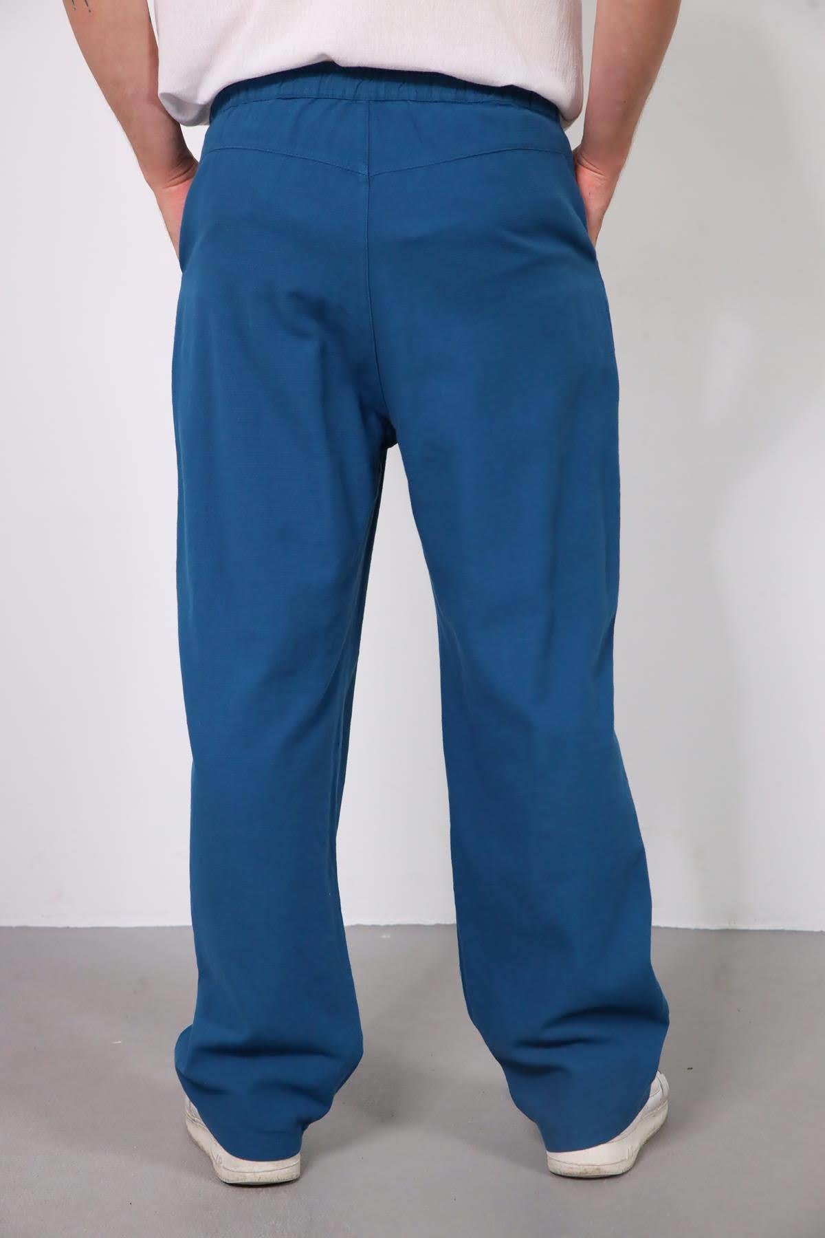  Petrol Mavisi Beli Lastikli Pileli Pantolon