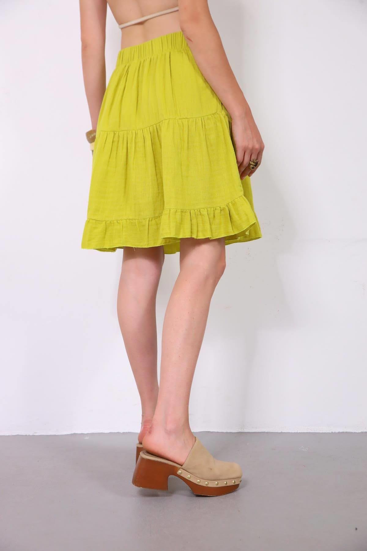  Fıstık Yeşili Asimetrik Püsküllü Müslin Etek