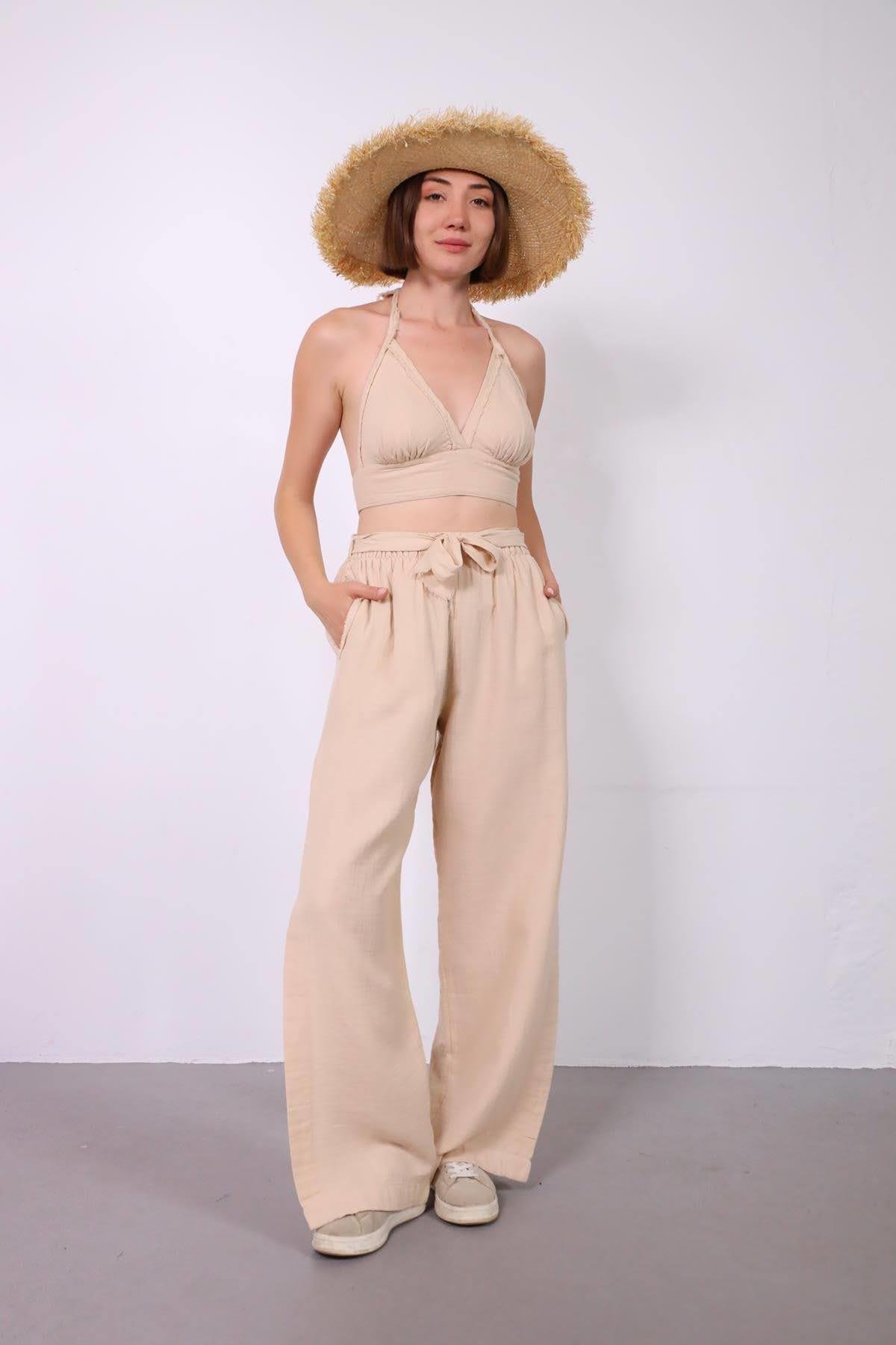 Krem Rengi Kemer ve Püskül Detaylı Yırtmaçlı Müslin Pantolon - Şaman Butik Krem Rengi Kemer ve Püskül Detaylı Yırtmaçlı Müslin Pantolon