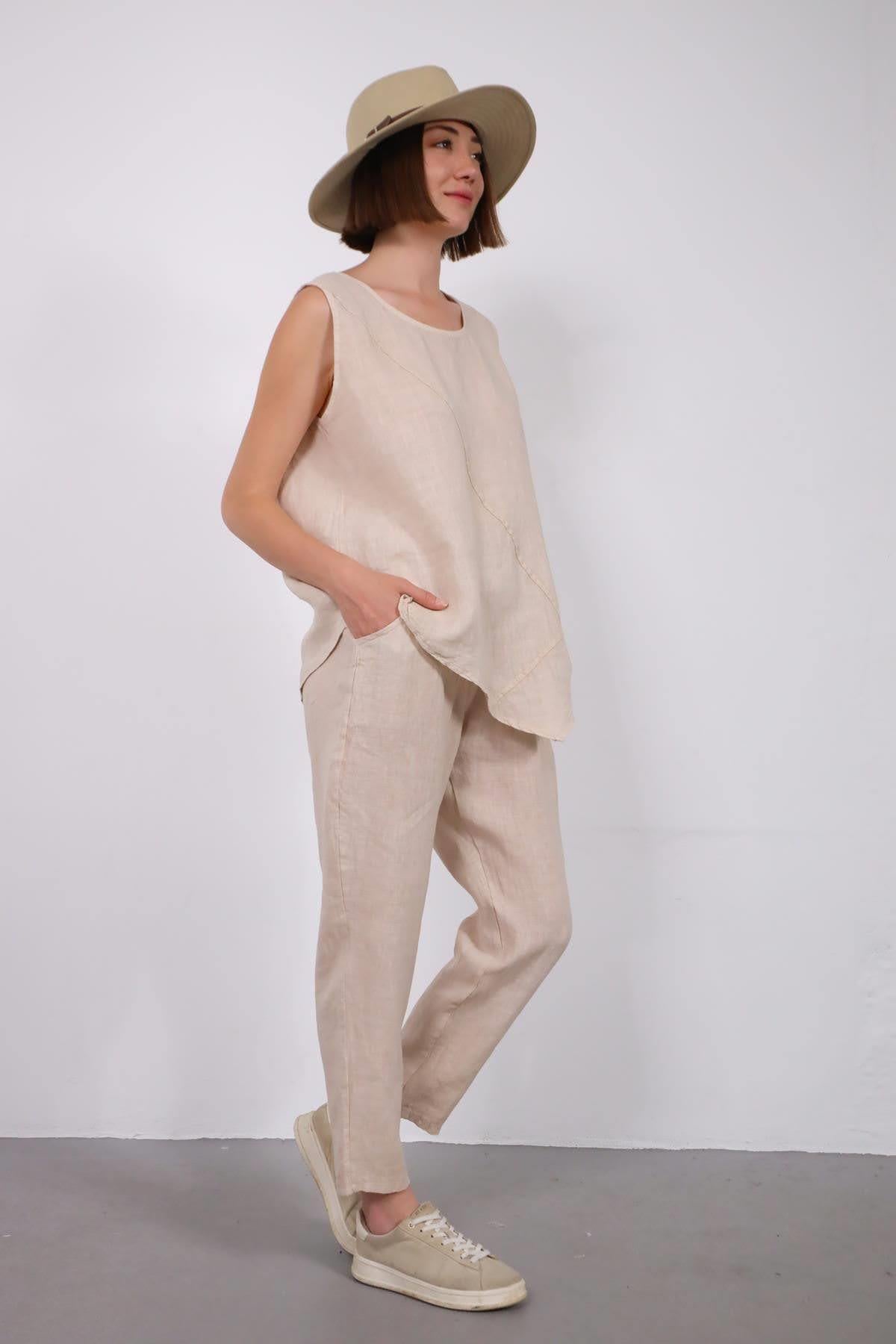 Krem Rengi Dikişli Sıfır Kol Bluz ve Pantolon Keten Takım - Şaman Butik Krem Rengi Dikişli Sıfır Kol Bluz ve Pantolon Keten Takım