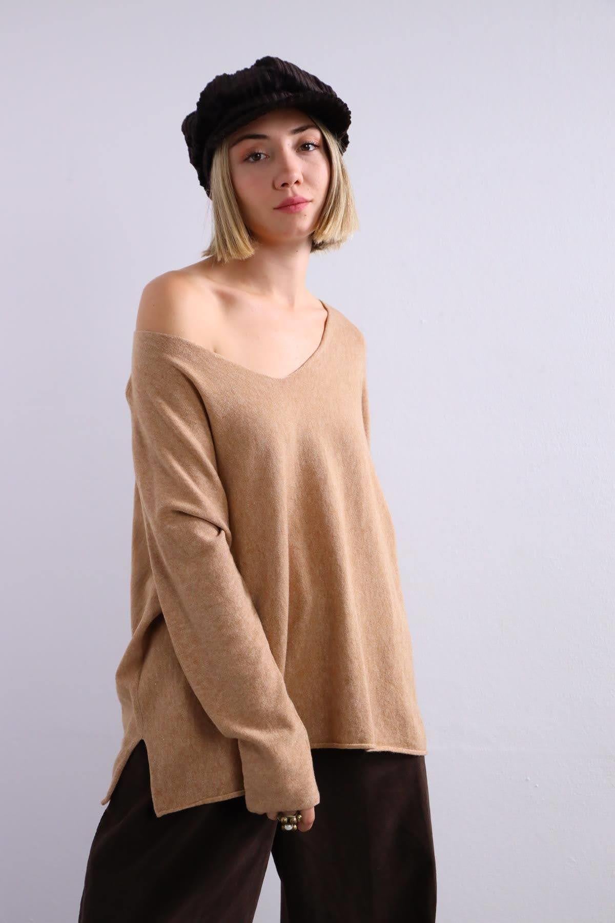 Krem Rengi Yumuşak Doku Yırtmaç Detaylı Bluz - Şaman Butik Krem Rengi Yumuşak Doku Yırtmaç Detaylı Bluz