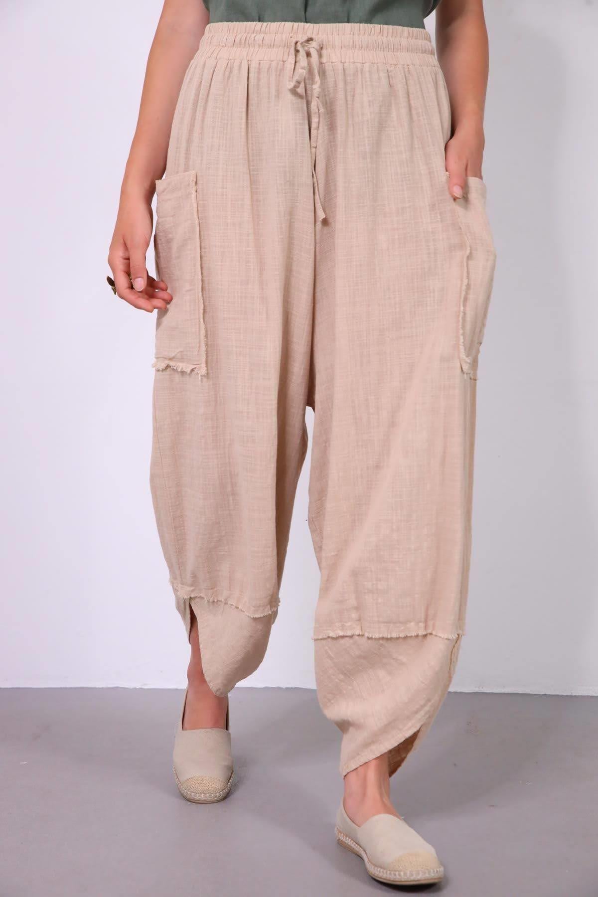 Krem Rengi Torba Cepli Püsküllü Paça Detaylı Pantolon - Şaman Butik Krem Rengi Torba Cepli Püsküllü Paça Detaylı Pantolon