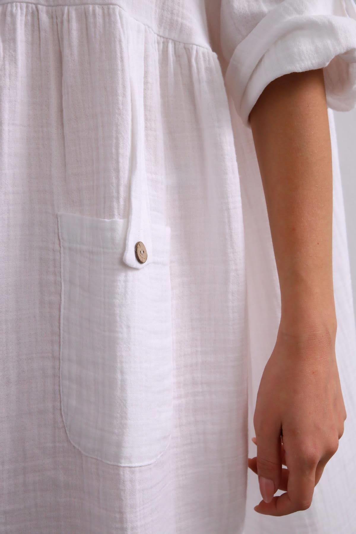 Beyaz Tek Cepli Kolu Apoletli Müslin Elbise - Şaman Butik Beyaz Tek Cepli Kolu Apoletli Müslin Elbise