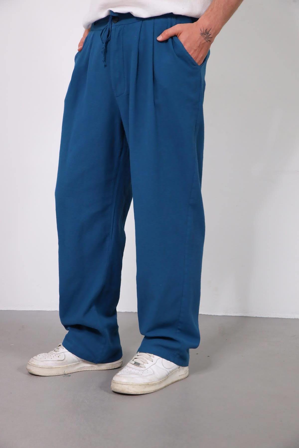  Petrol Mavisi Beli Lastikli Pileli Pantolon